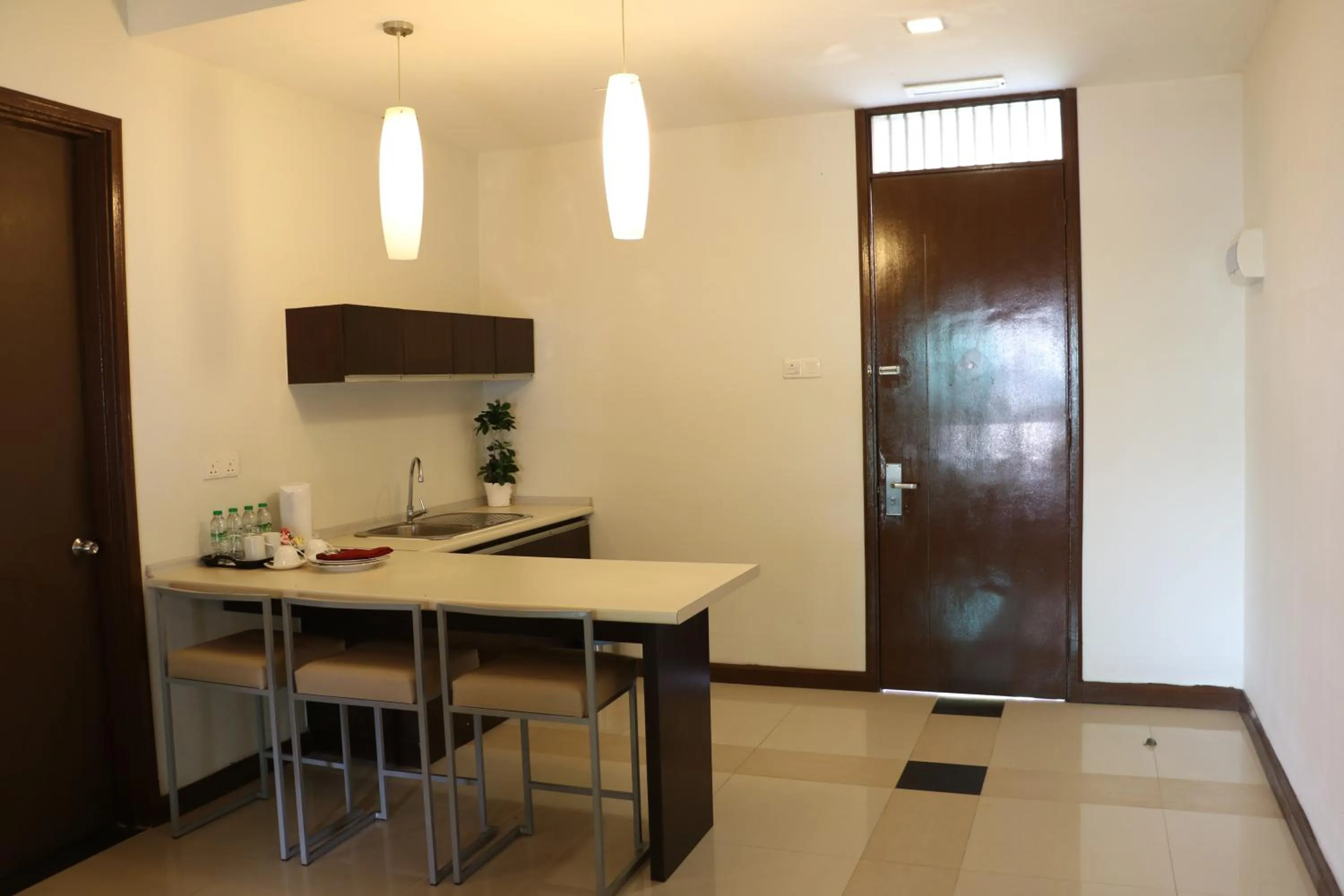 Kitchen or kitchenette in Hotel Felda Residence Tanjung Leman