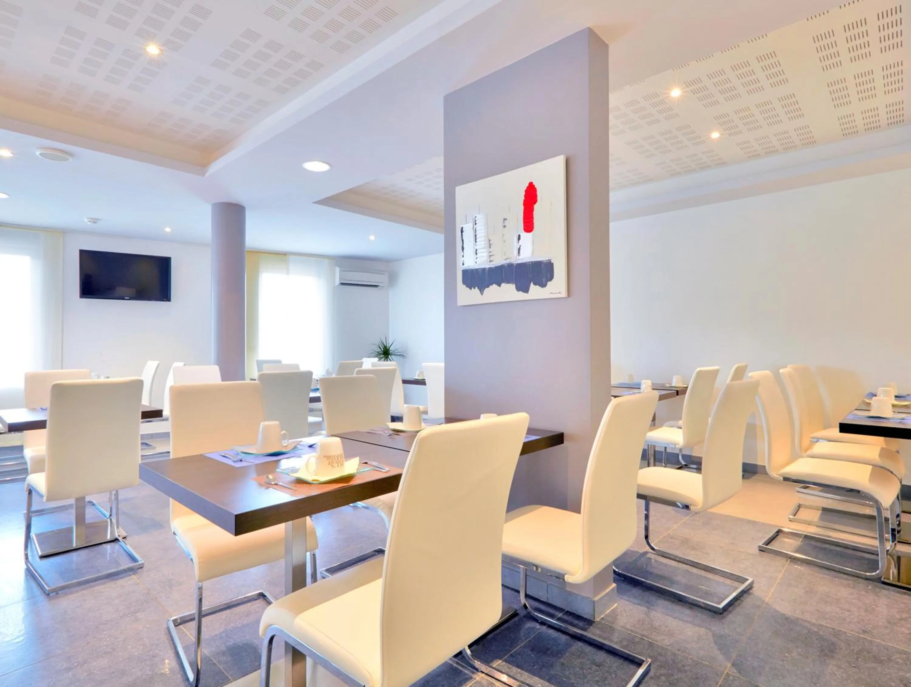 Communal lounge/ TV room in Kyriad Saint Chély d'Apcher - Aire de la Lozère