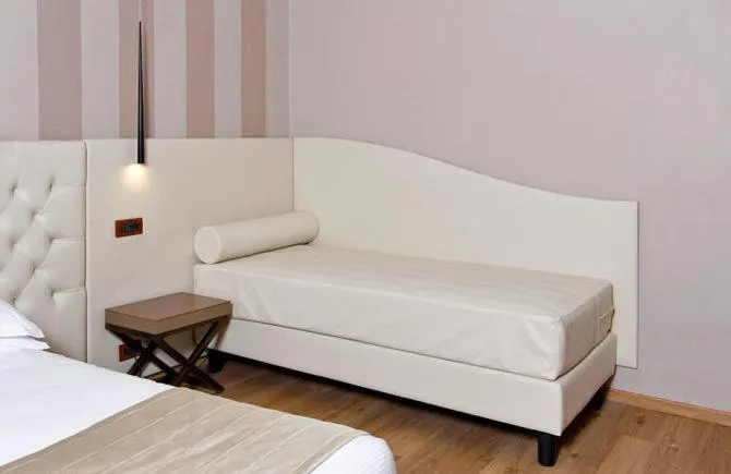 Bed in Hotel Arcangelo