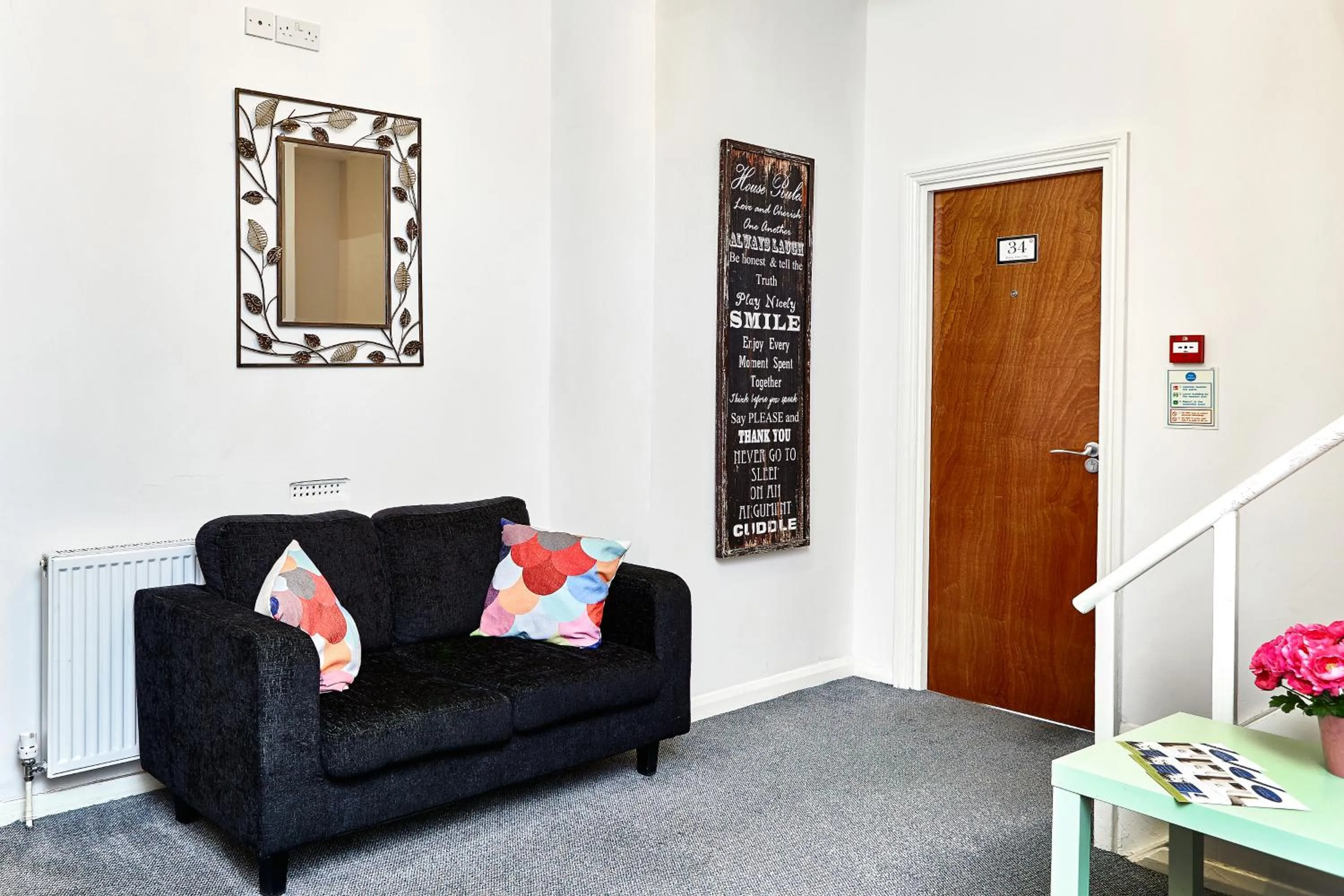 Communal lounge/ TV room in United Lodge Hotel