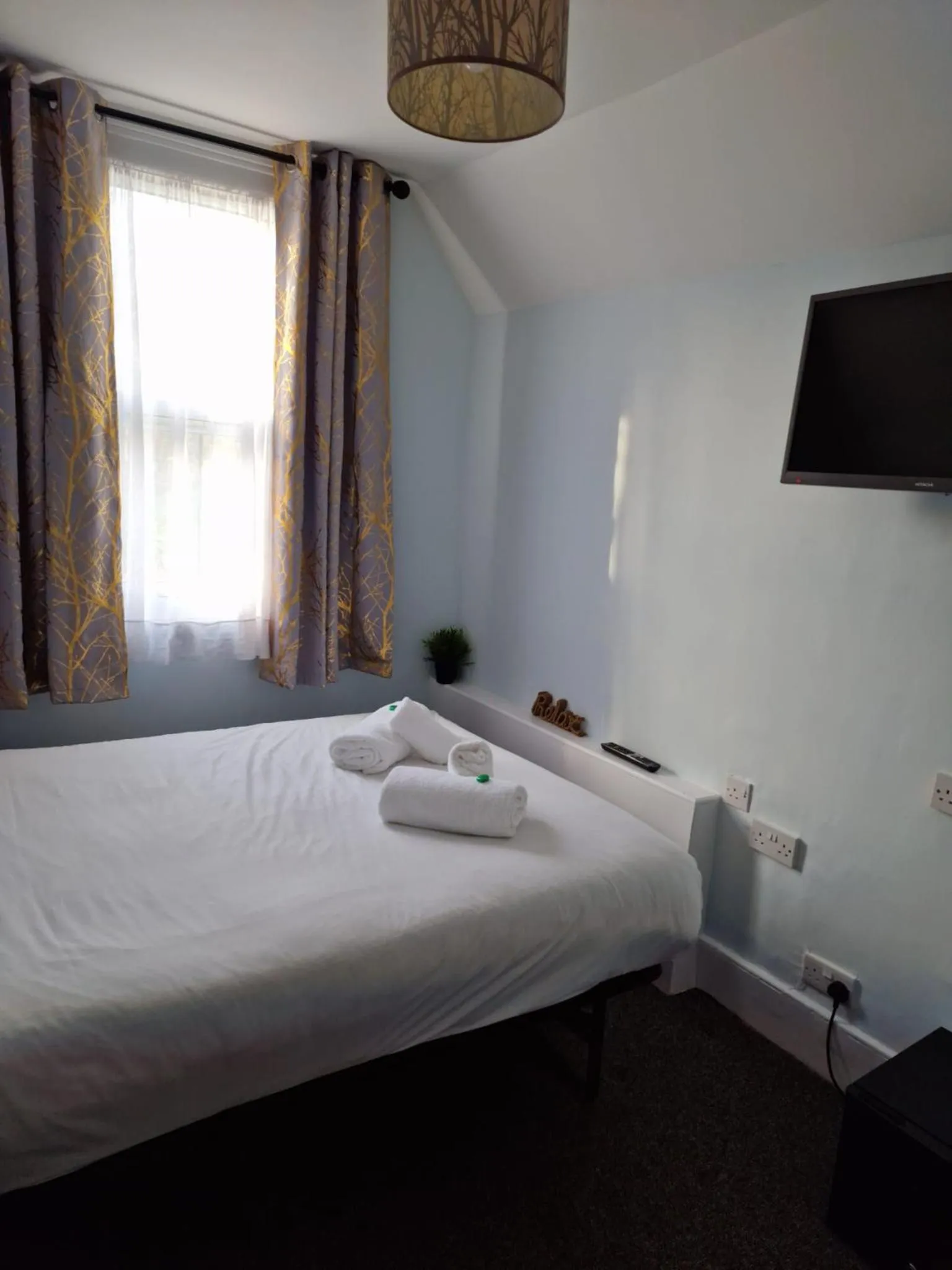 Bed in United Lodge Hotel