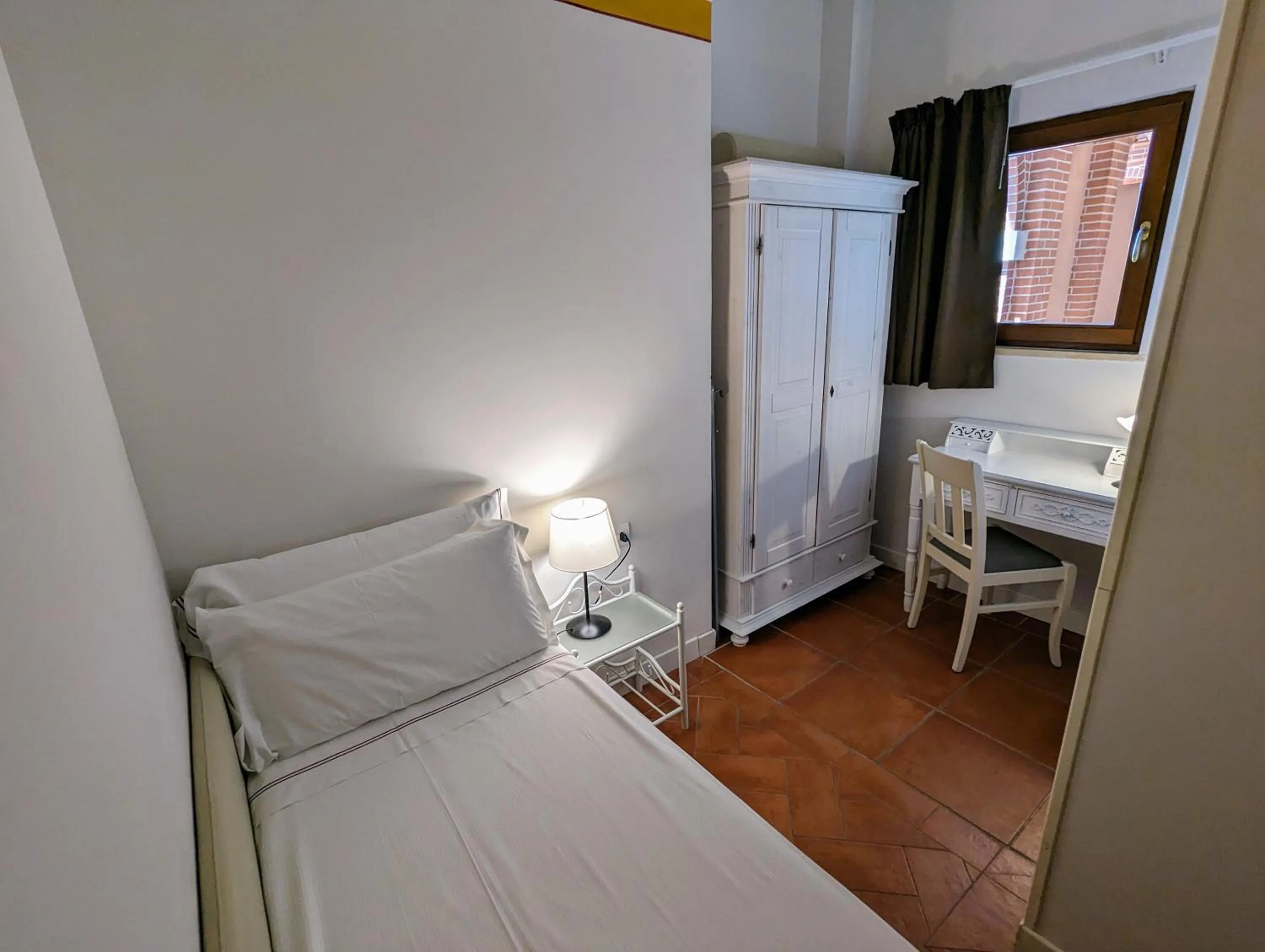 Bed in Saturnia Tuscany Hotel