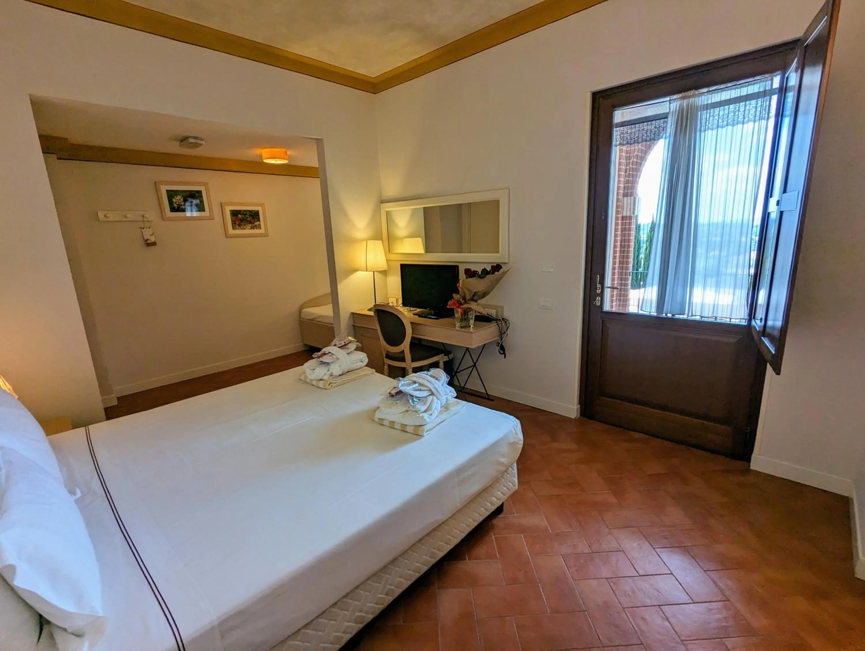 Bed in Saturnia Tuscany Hotel