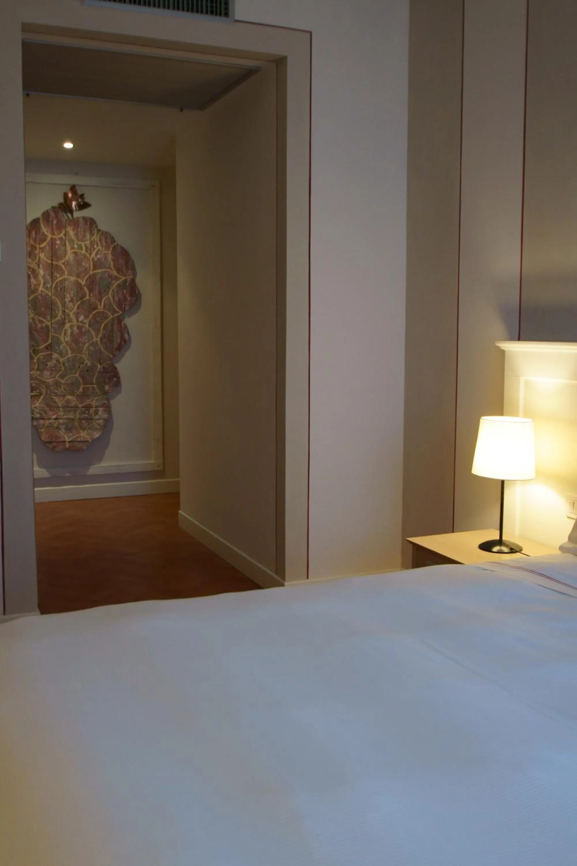 Decorative detail, Bed in Saturnia Tuscany Hotel