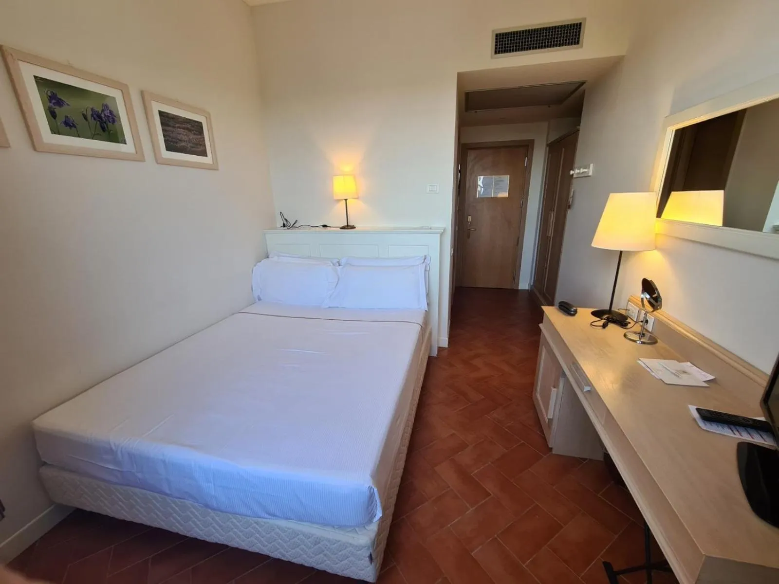 Bed in Saturnia Tuscany Hotel