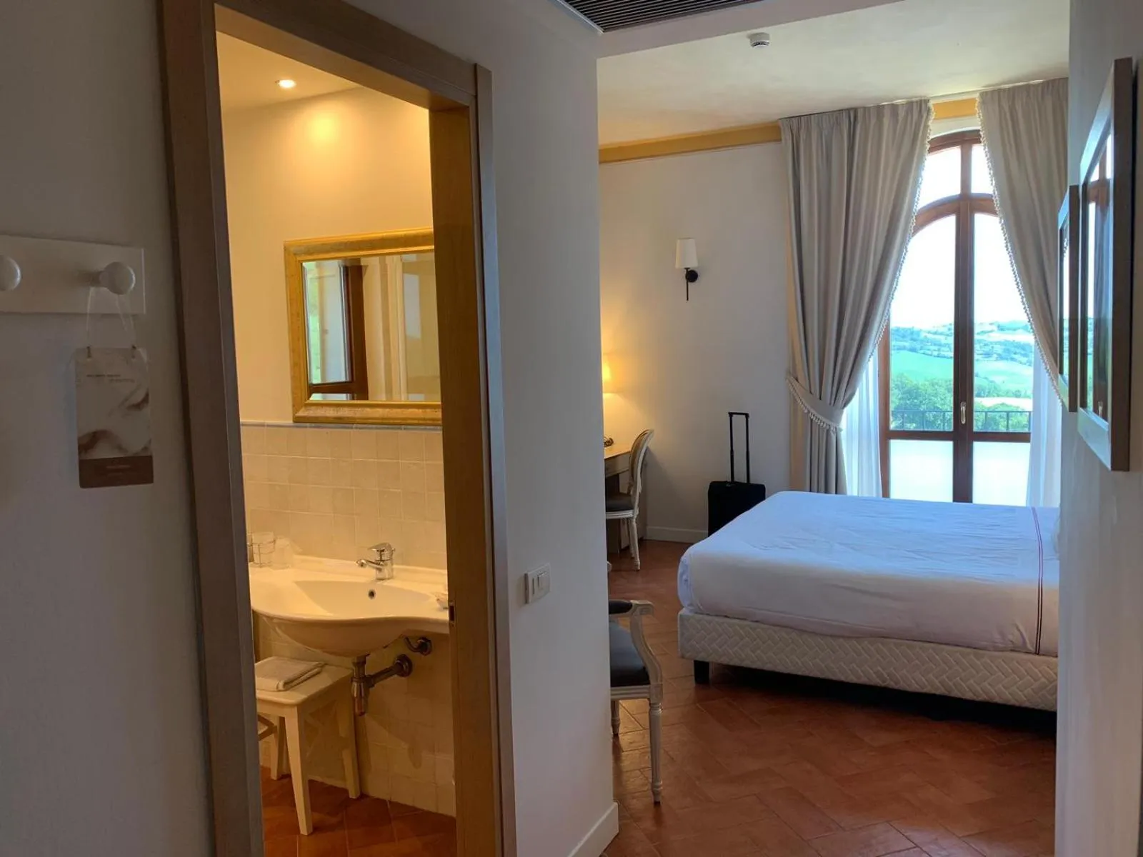 Bed in Saturnia Tuscany Hotel