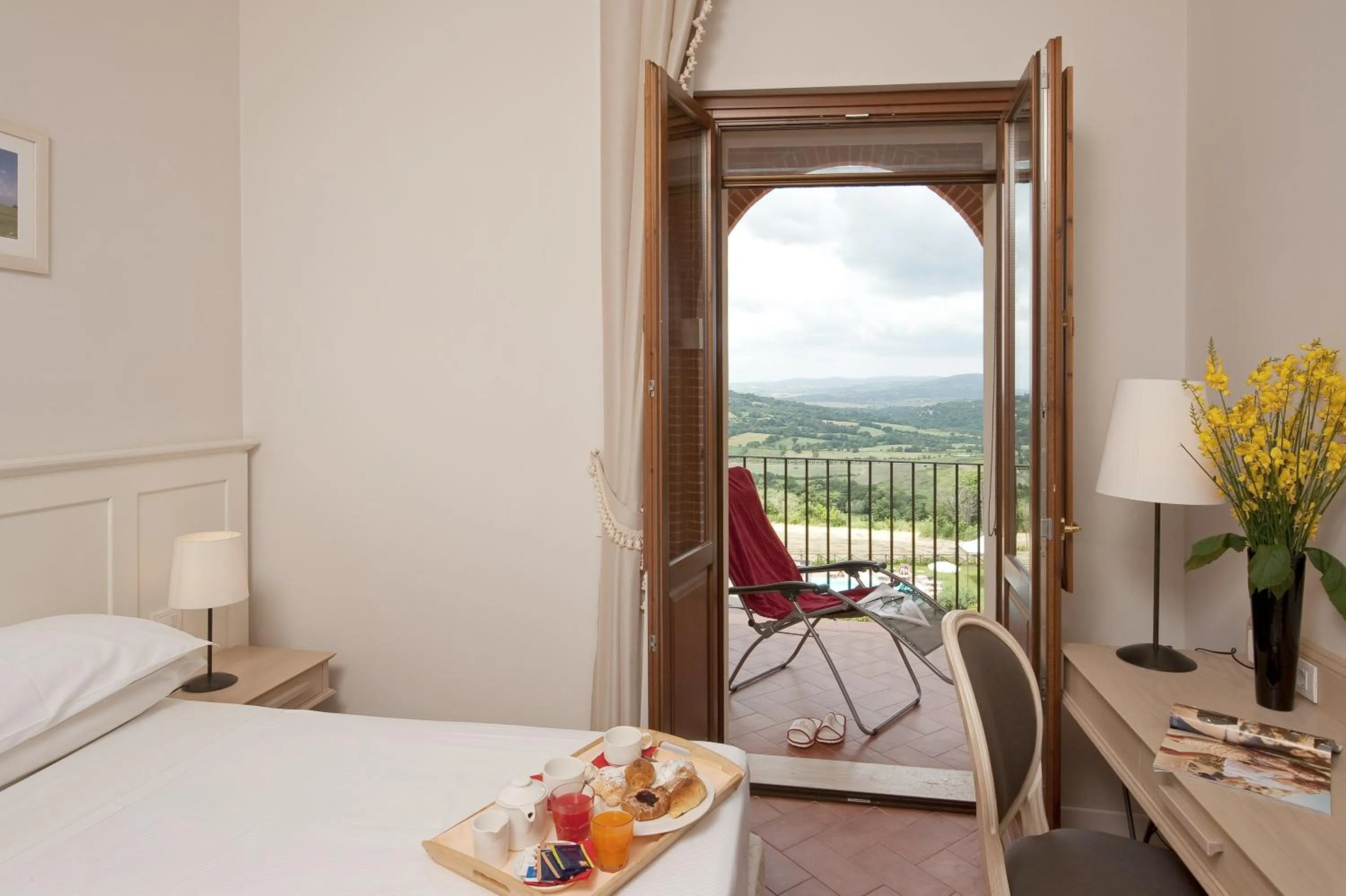 Photo of the whole room, Bed in Saturnia Tuscany Hotel