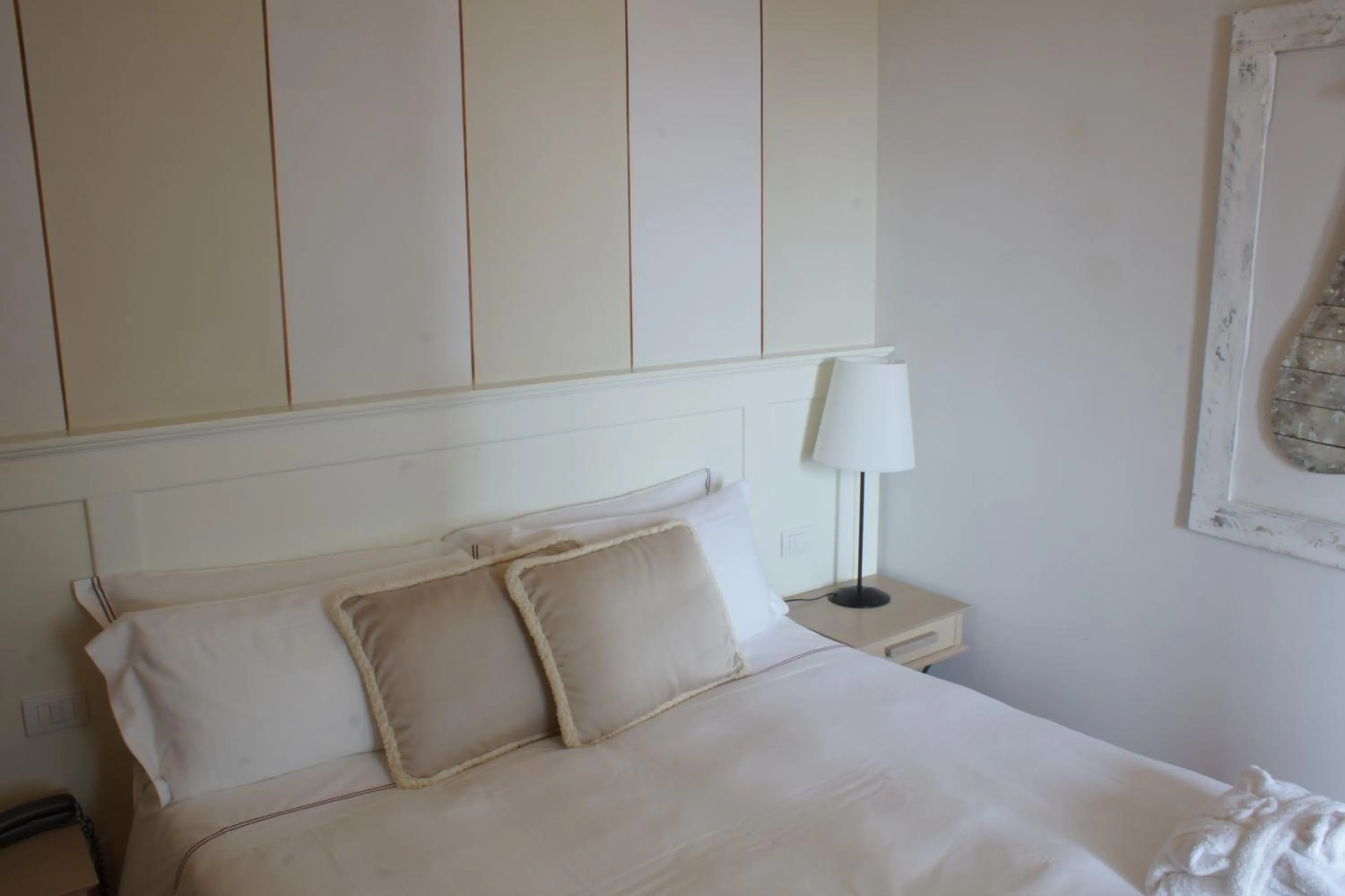 Bed in Saturnia Tuscany Hotel