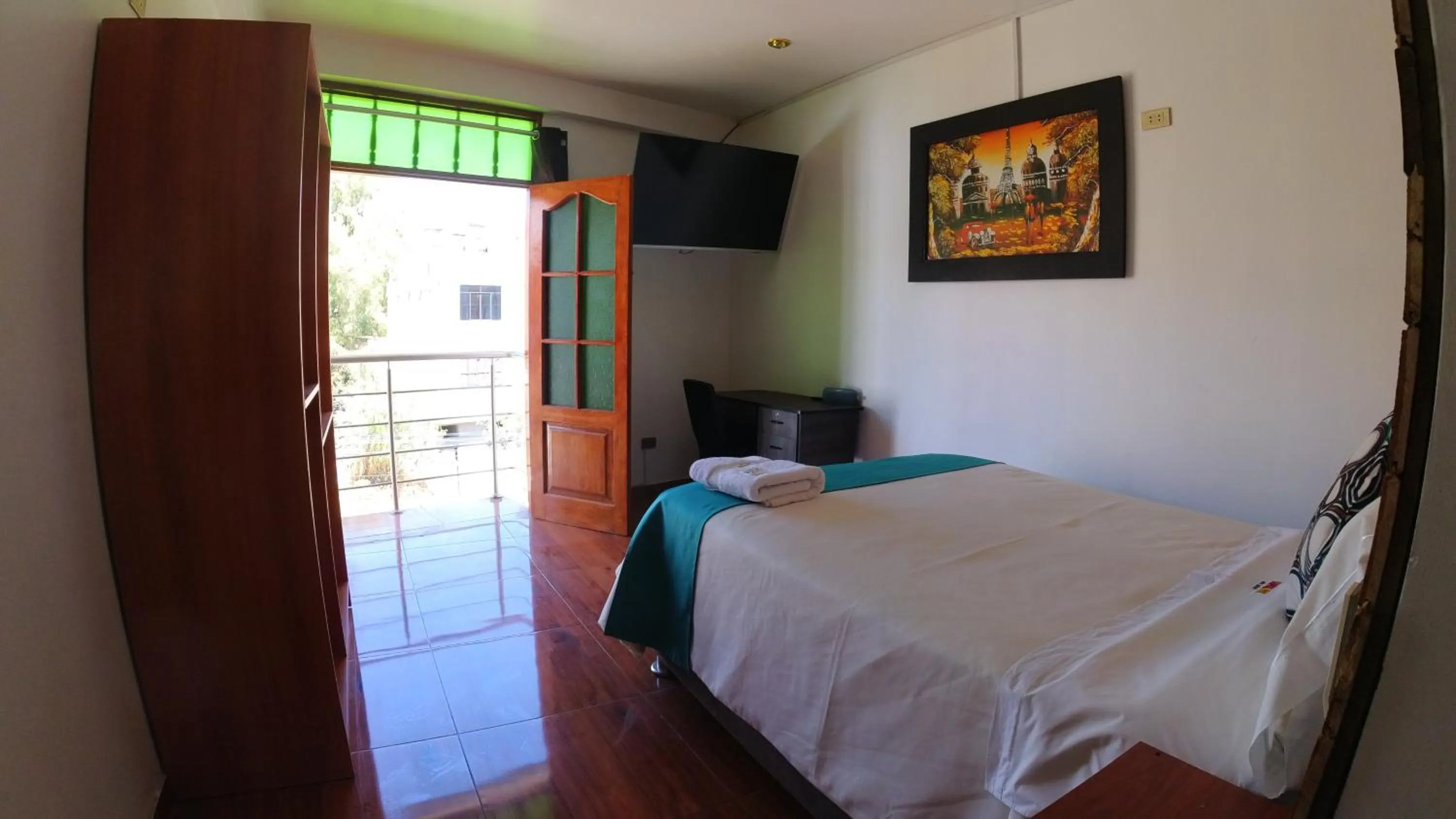 Bed in Sumaq Wari Hotel