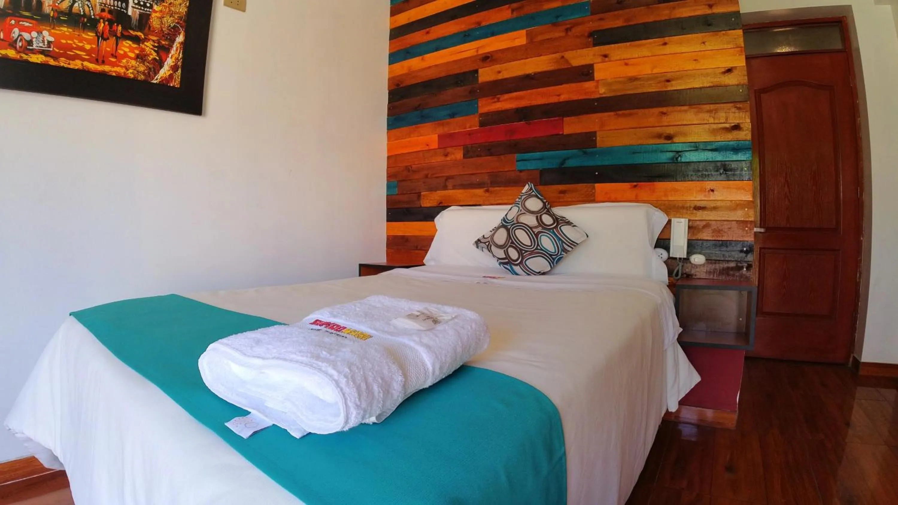 Bed in Sumaq Wari Hotel