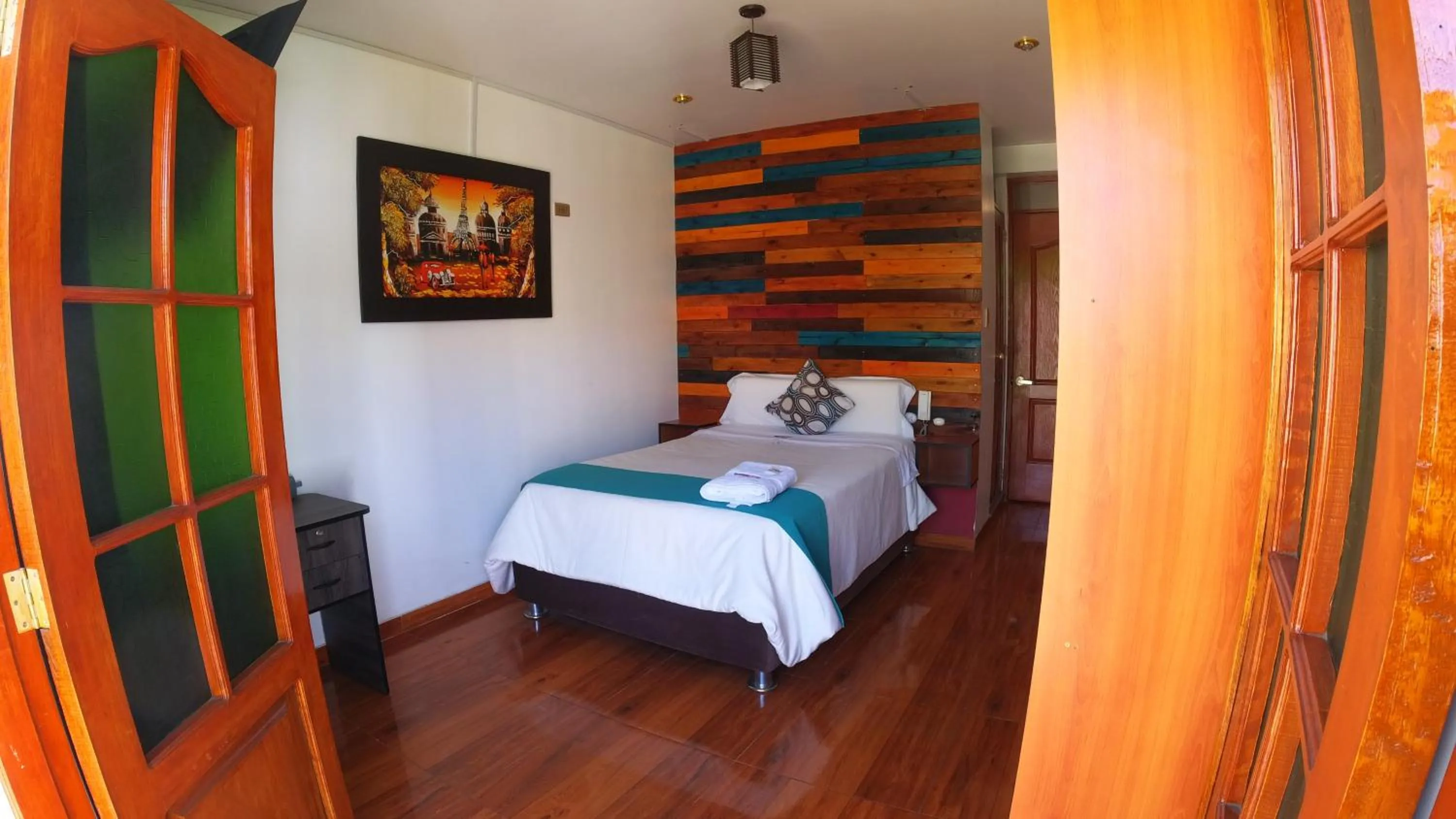 Bed in Sumaq Wari Hotel