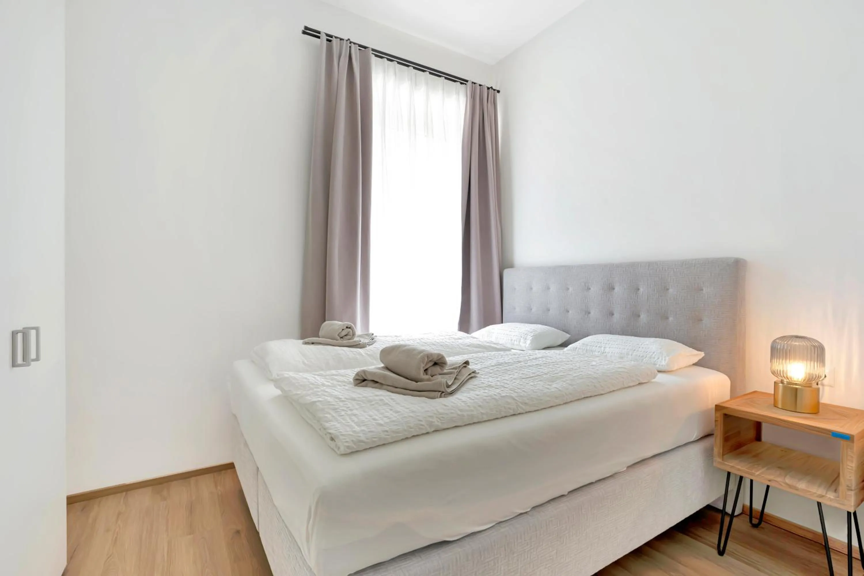 Bed in easy-flat Hauptplatz - City Center Apartments with a Kitchen