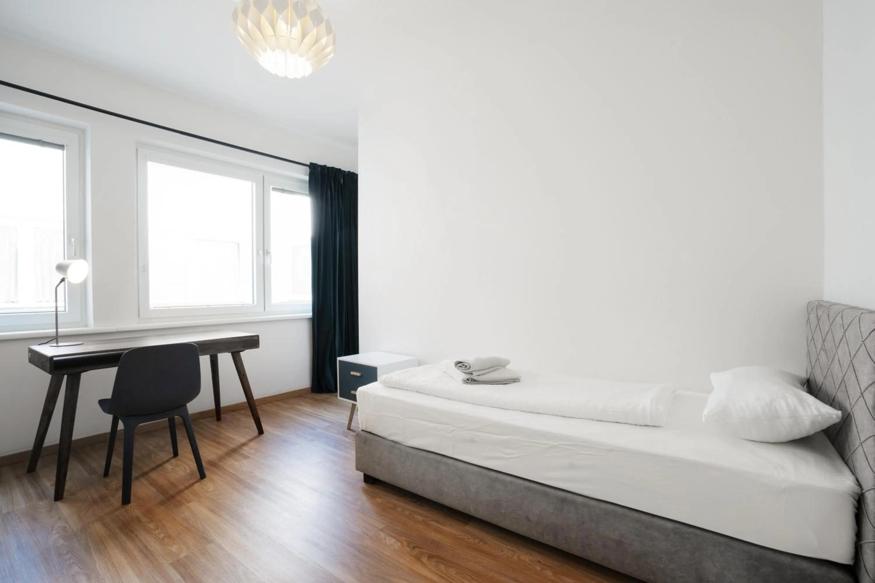 Bed in easy-flat Hauptplatz - City Center Apartments with a Kitchen