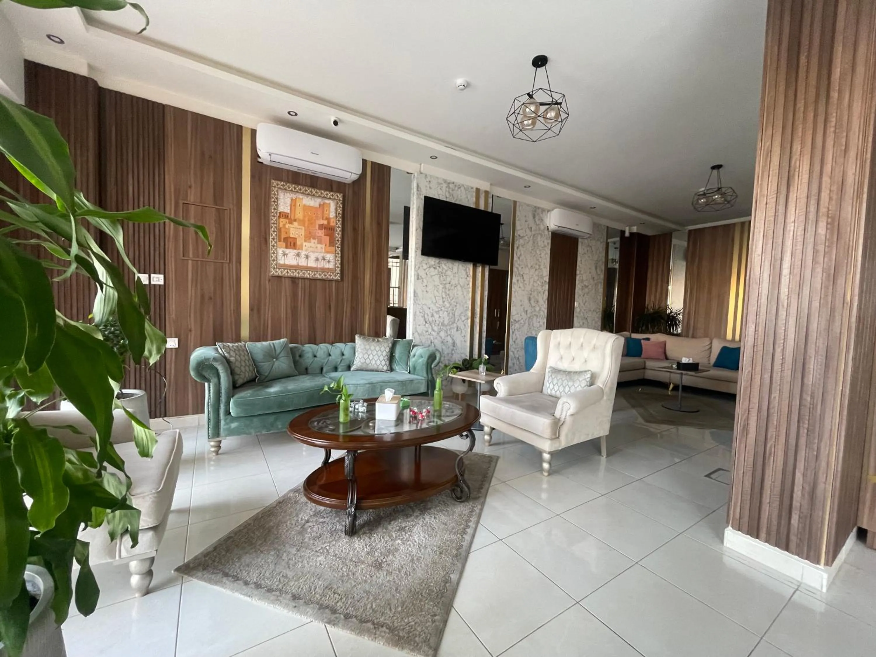 Communal lounge/ TV room in Aster Hotel Aqaba