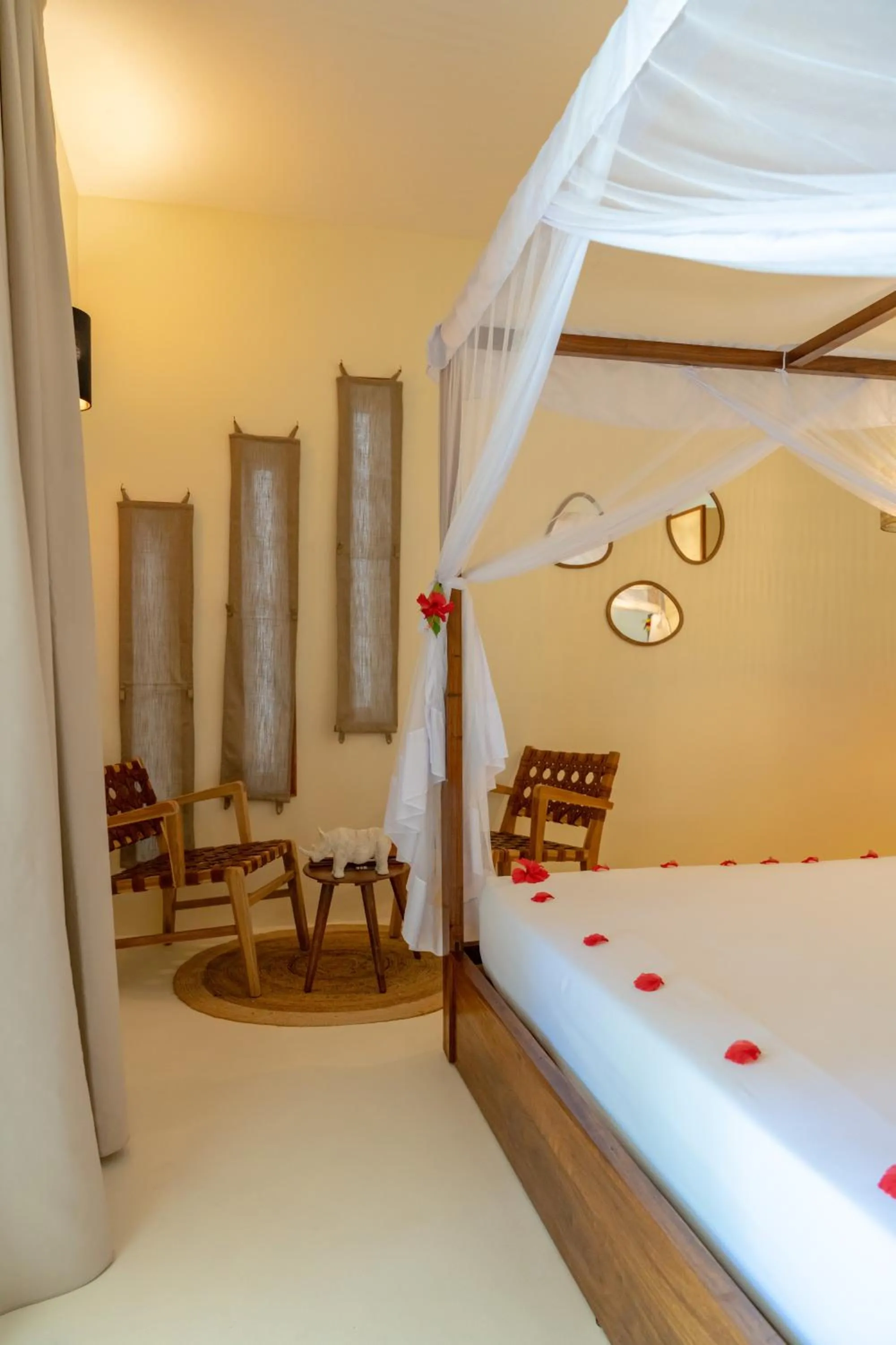 Seating area, Bed in Alma Boutique Hotel