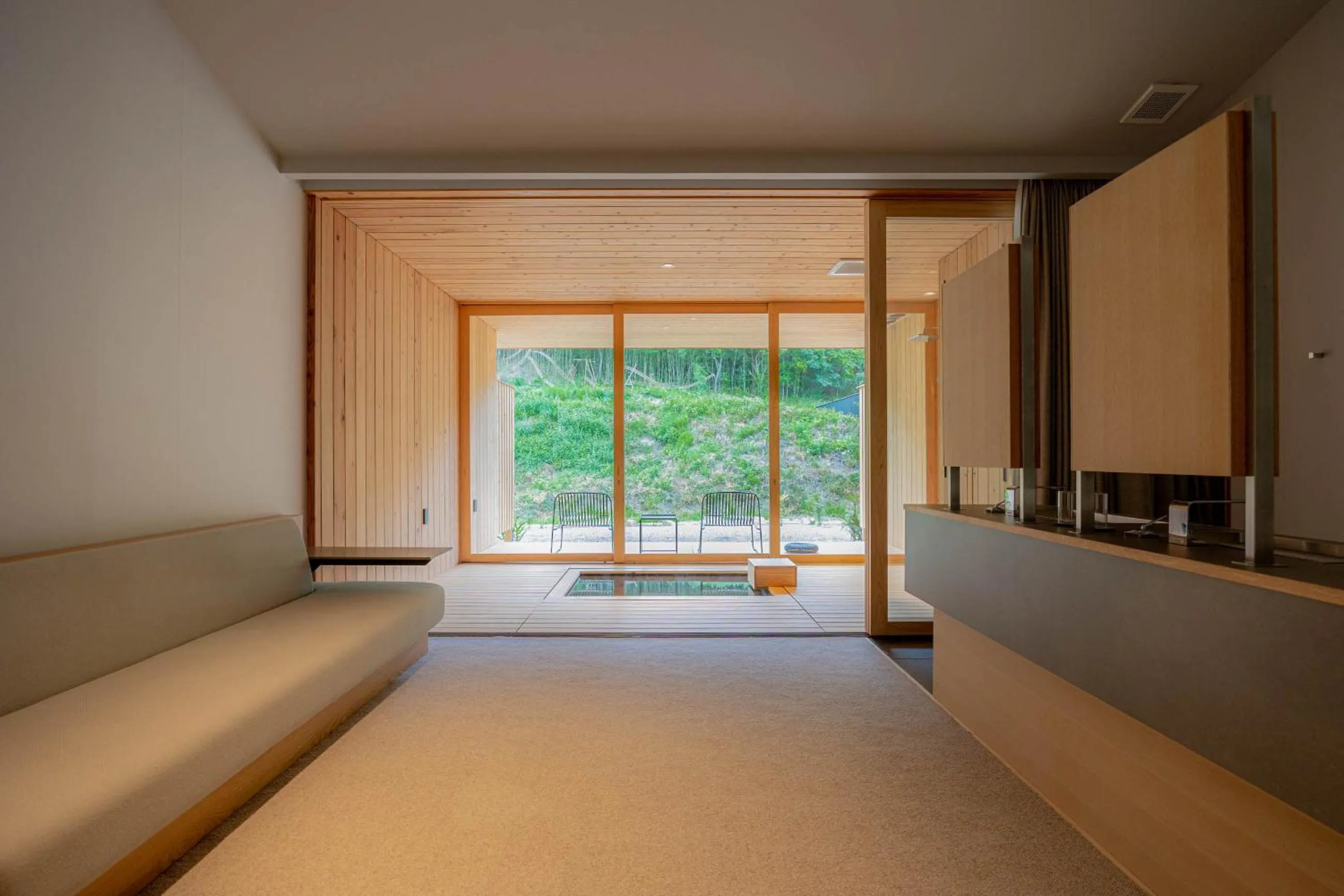 Living room, Bed in Naoshima Ryokan Roka