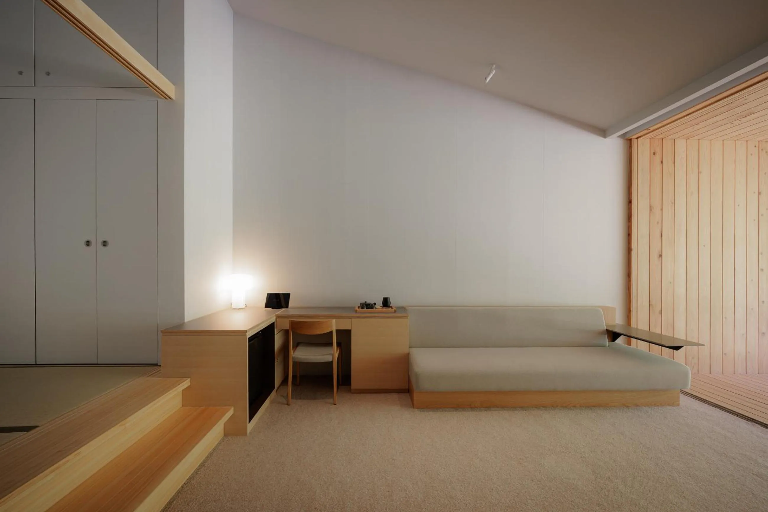 Living room, Bed in Naoshima Ryokan Roka