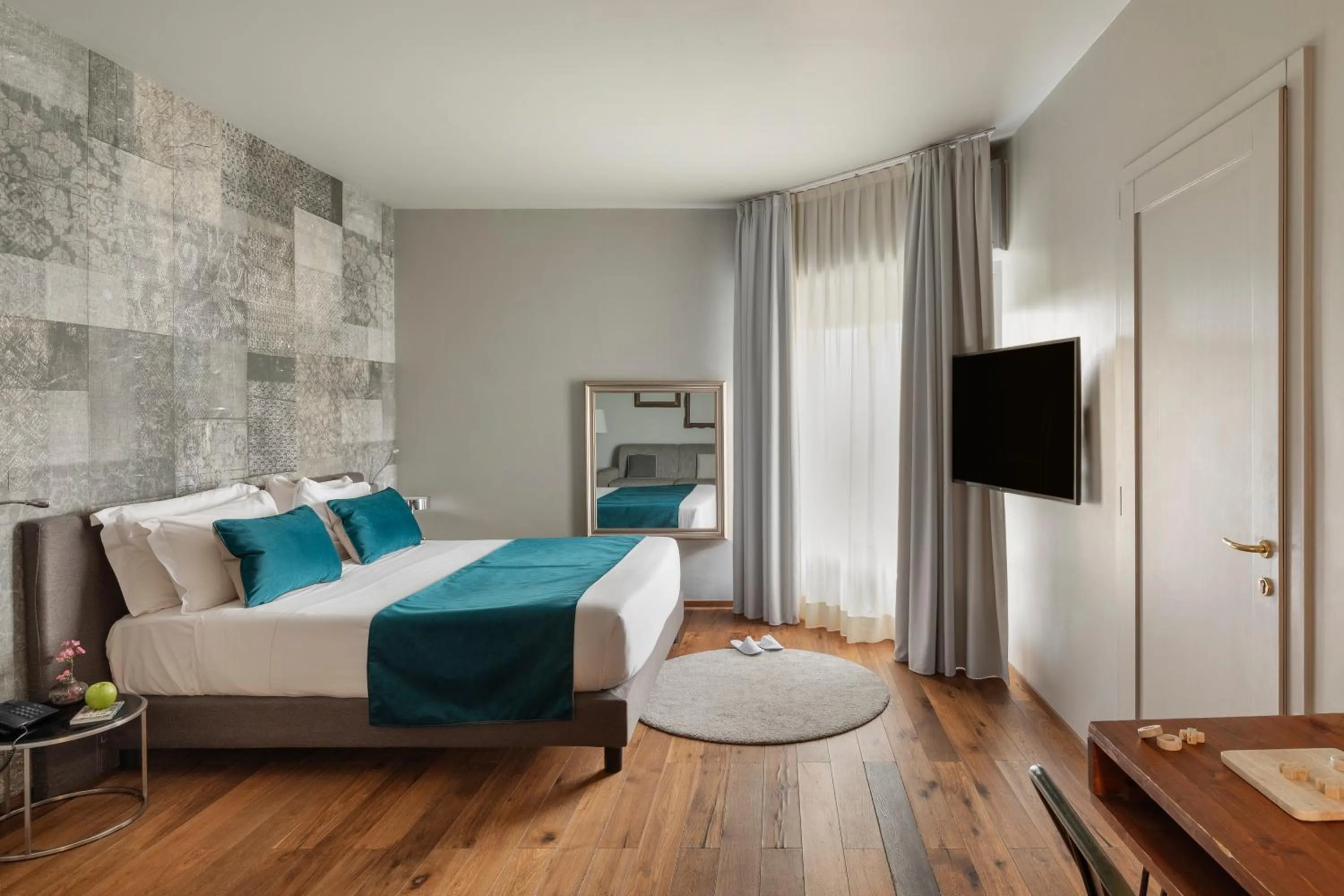 Bed in Living Hotel Milano