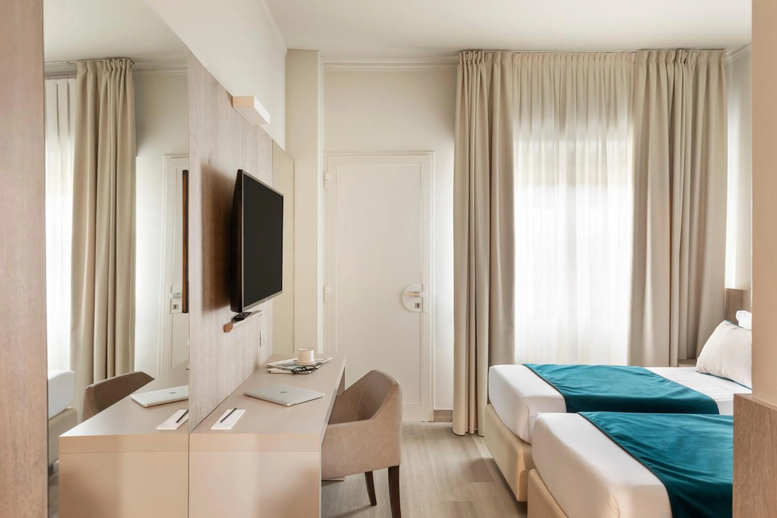 Bed in Living Hotel Milano