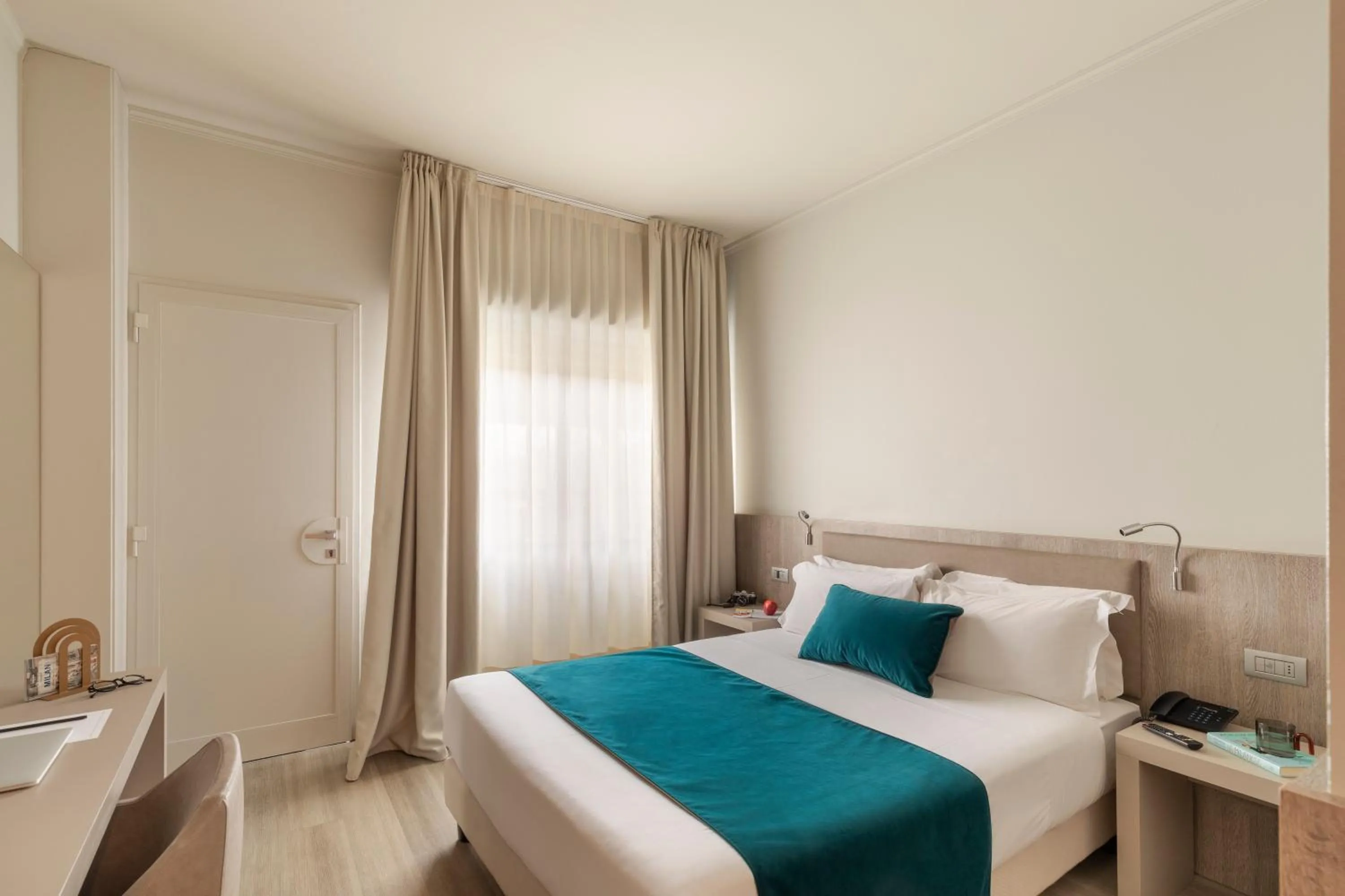 Bed in Living Hotel Milano
