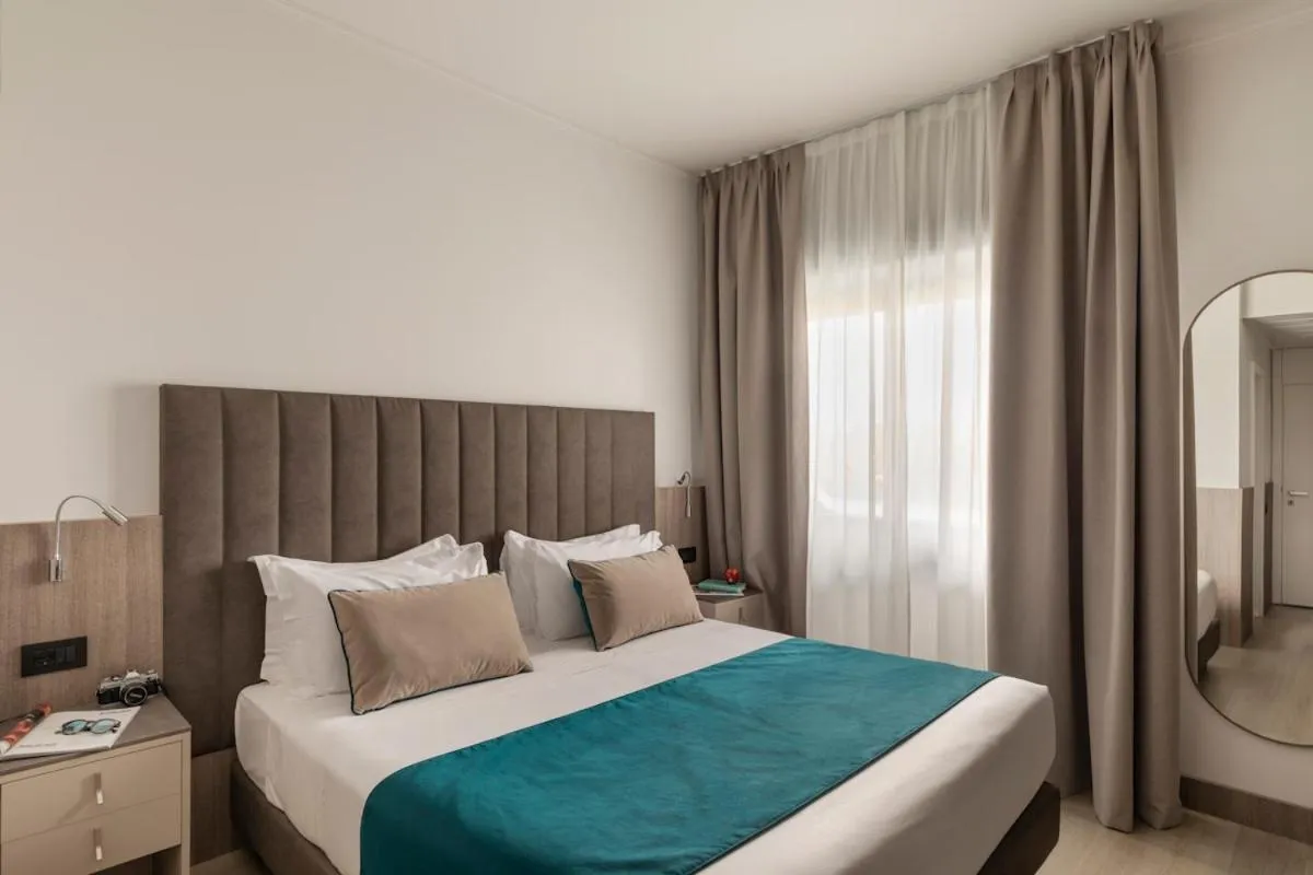 Bed in Living Hotel Milano