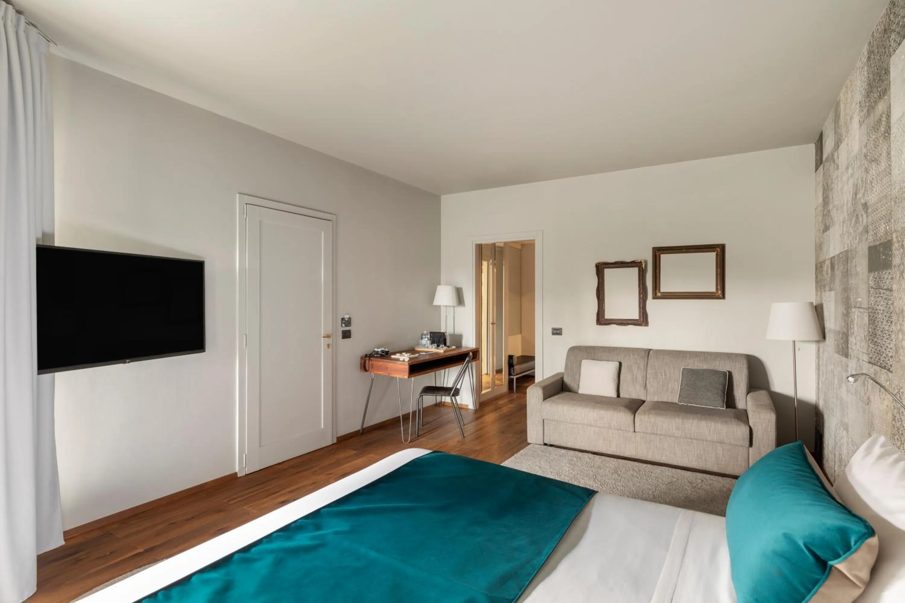 Bed in Living Hotel Milano