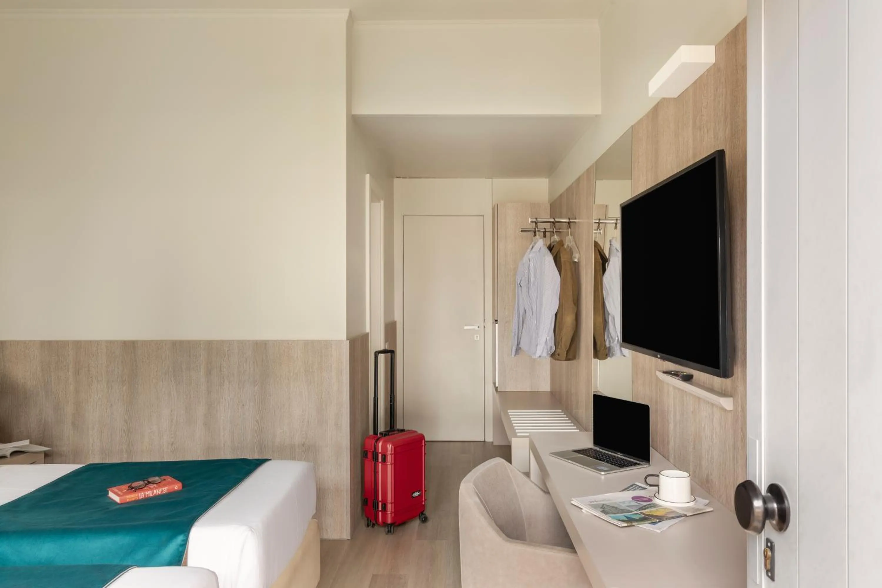 Bed in Living Hotel Milano