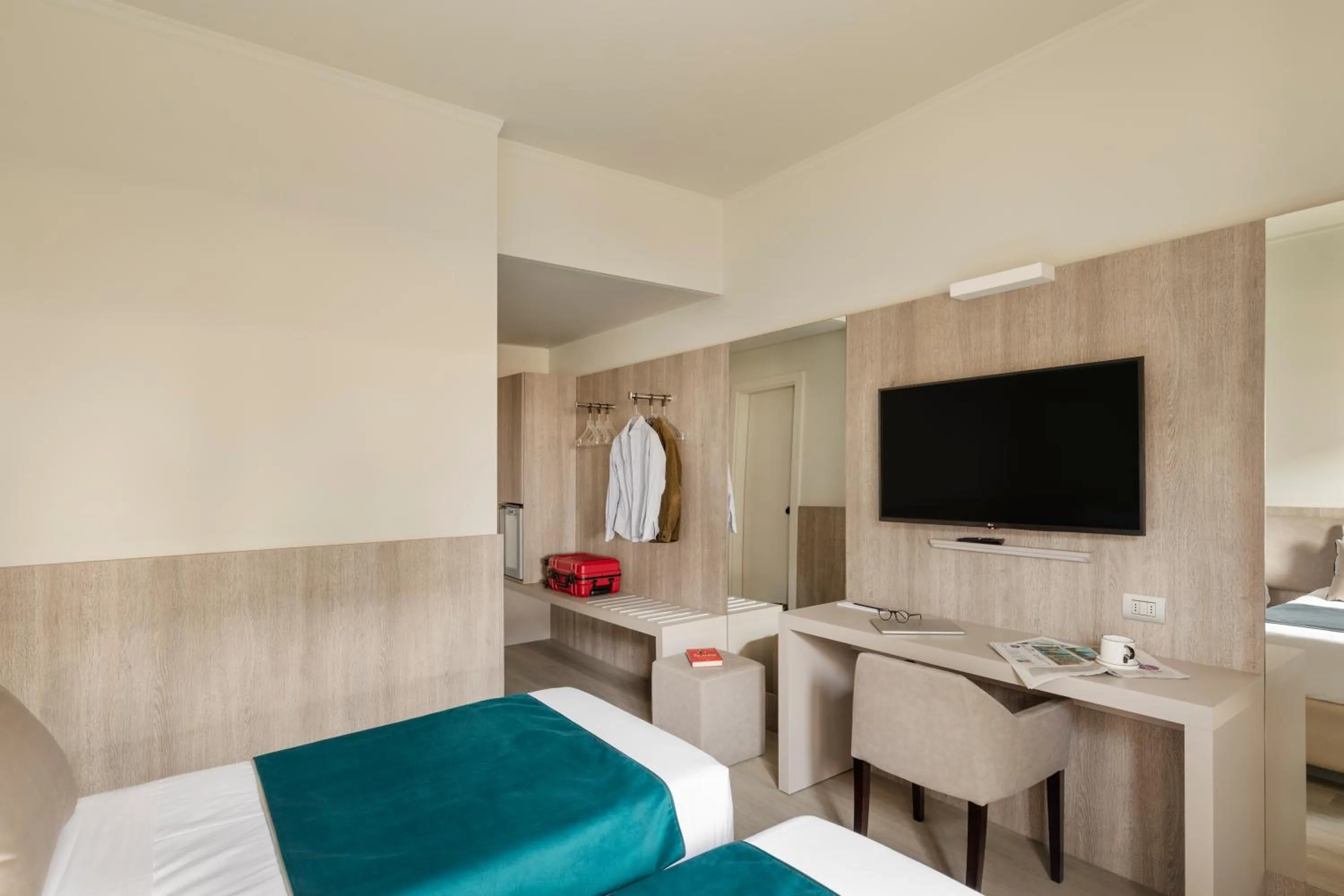 Bed in Living Hotel Milano