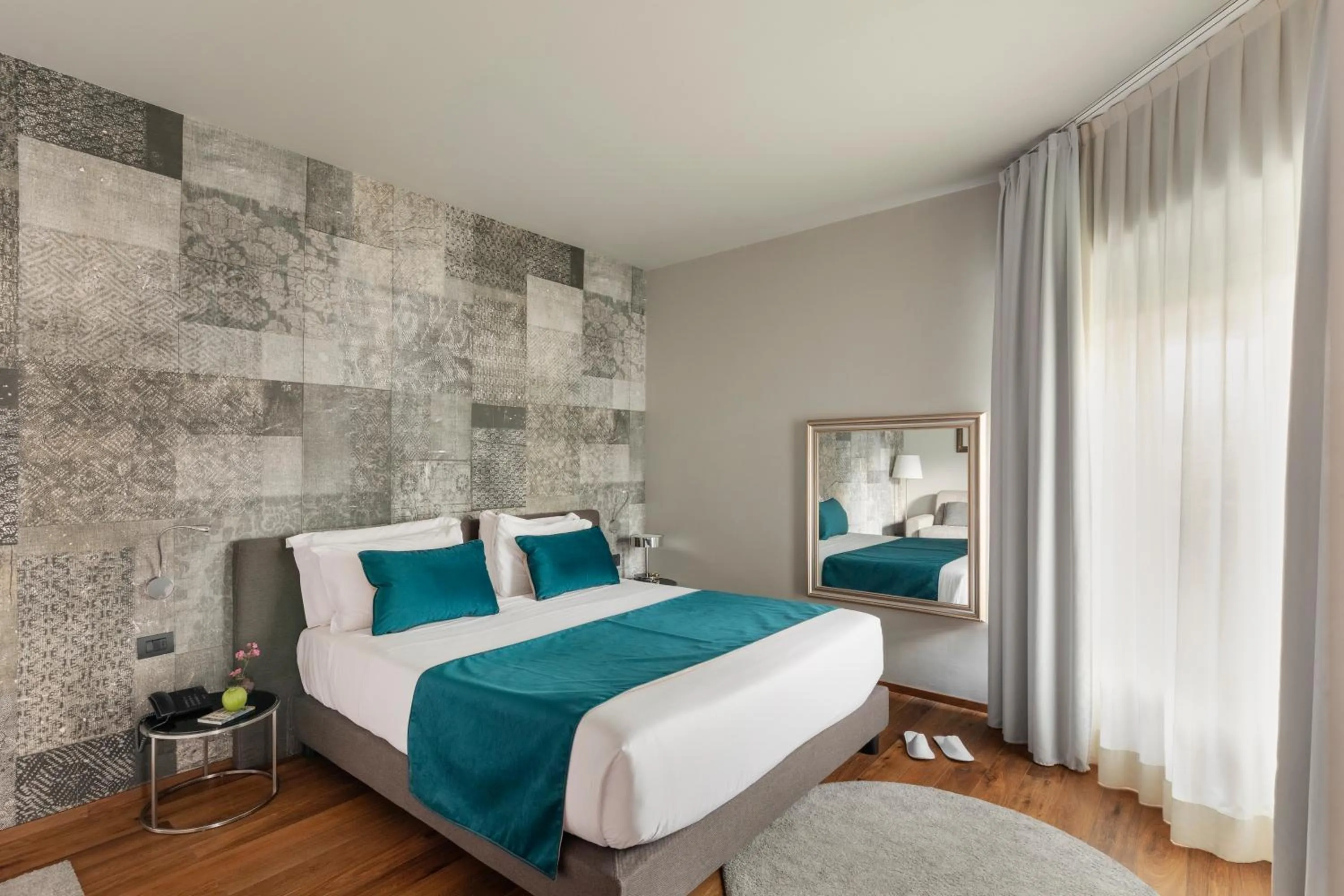 Bed in Living Hotel Milano