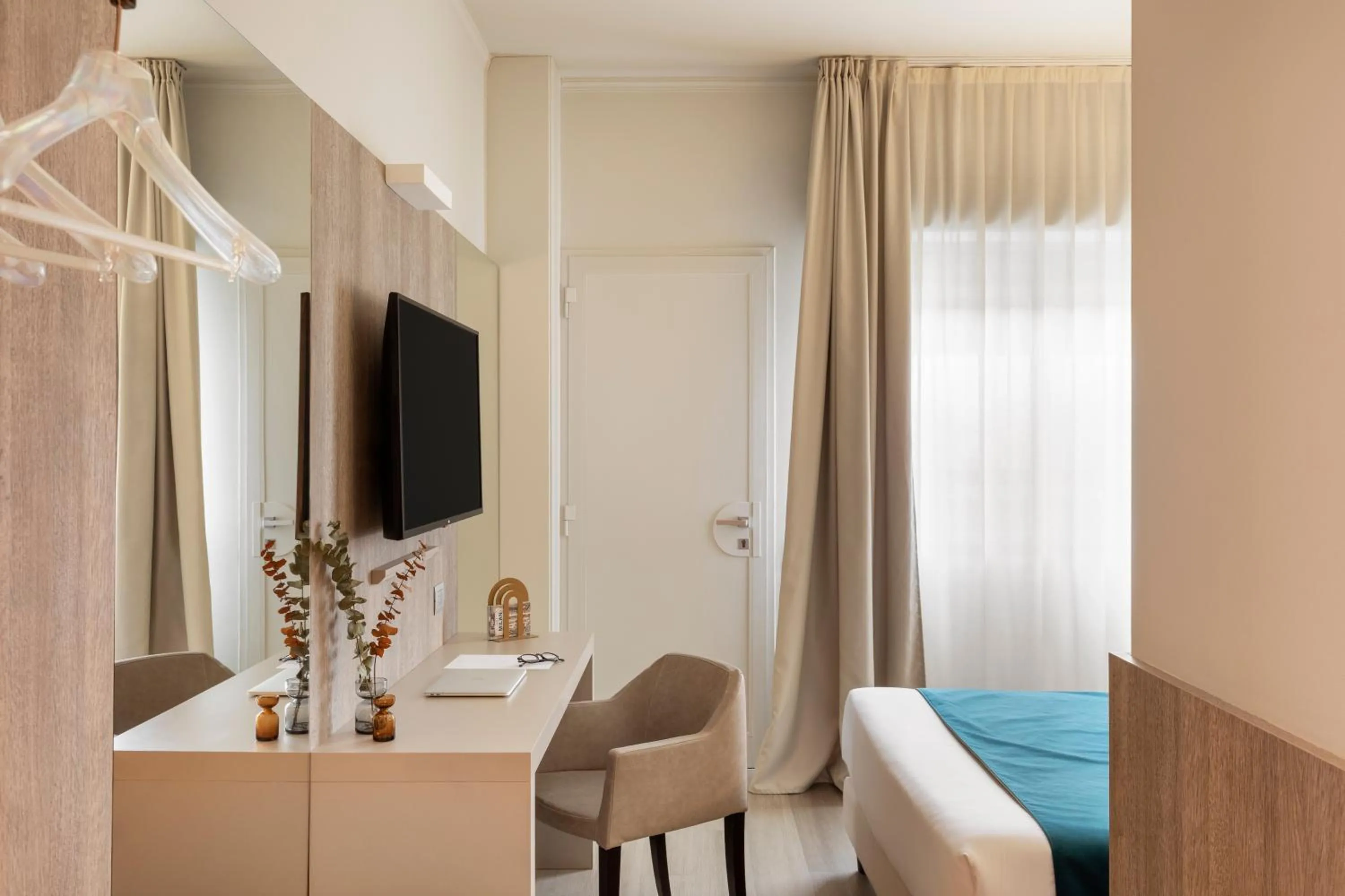 Bed in Living Hotel Milano