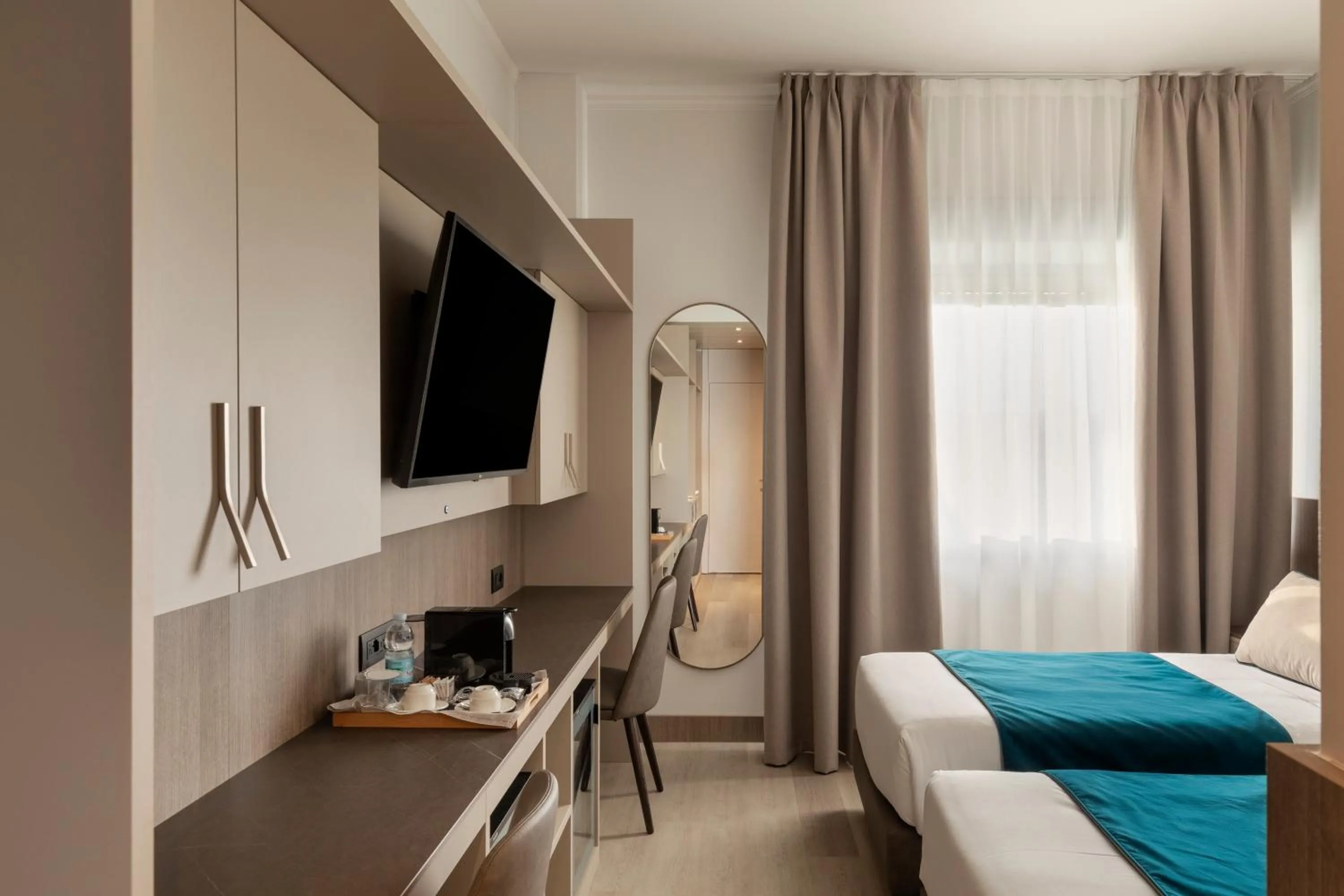 Bed in Living Hotel Milano
