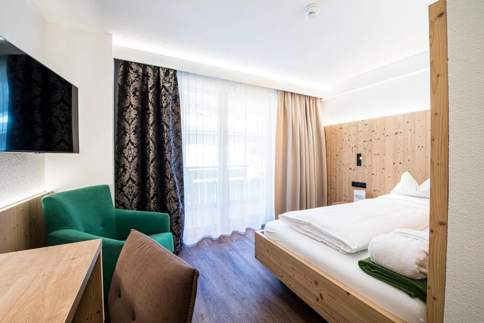 Bed in Alphotel Stocker Alpine Wellnesshotel