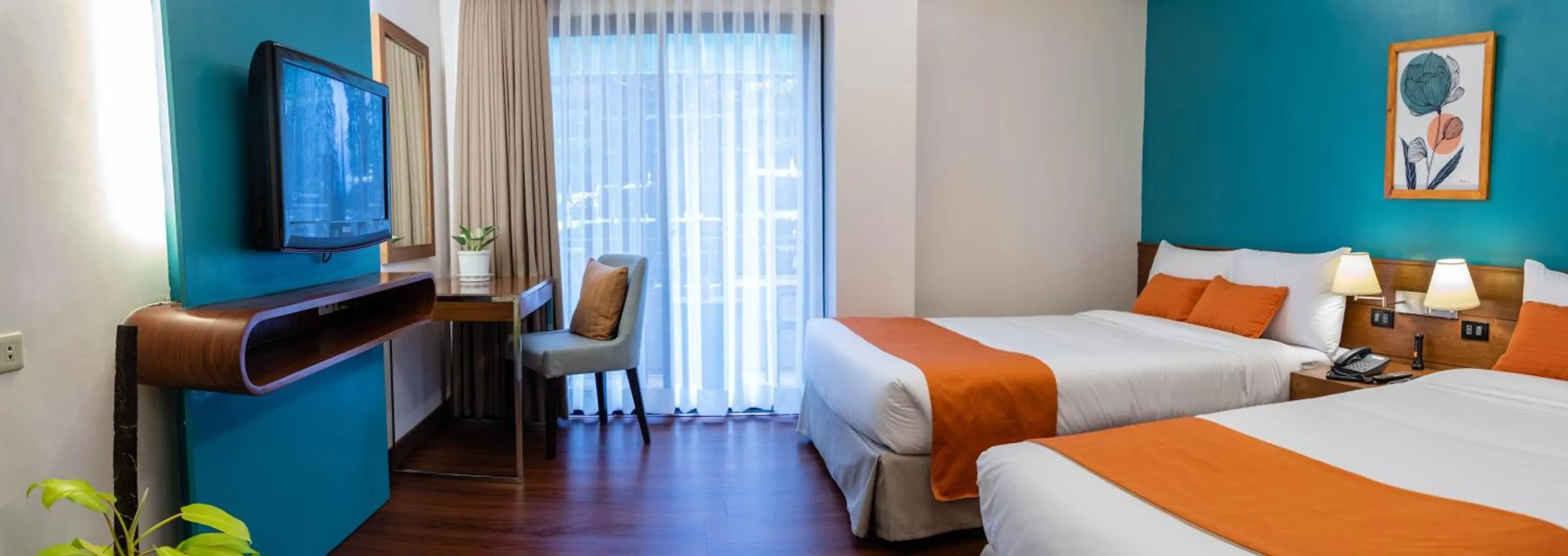 Bed in Giraffe Boutique Hotel