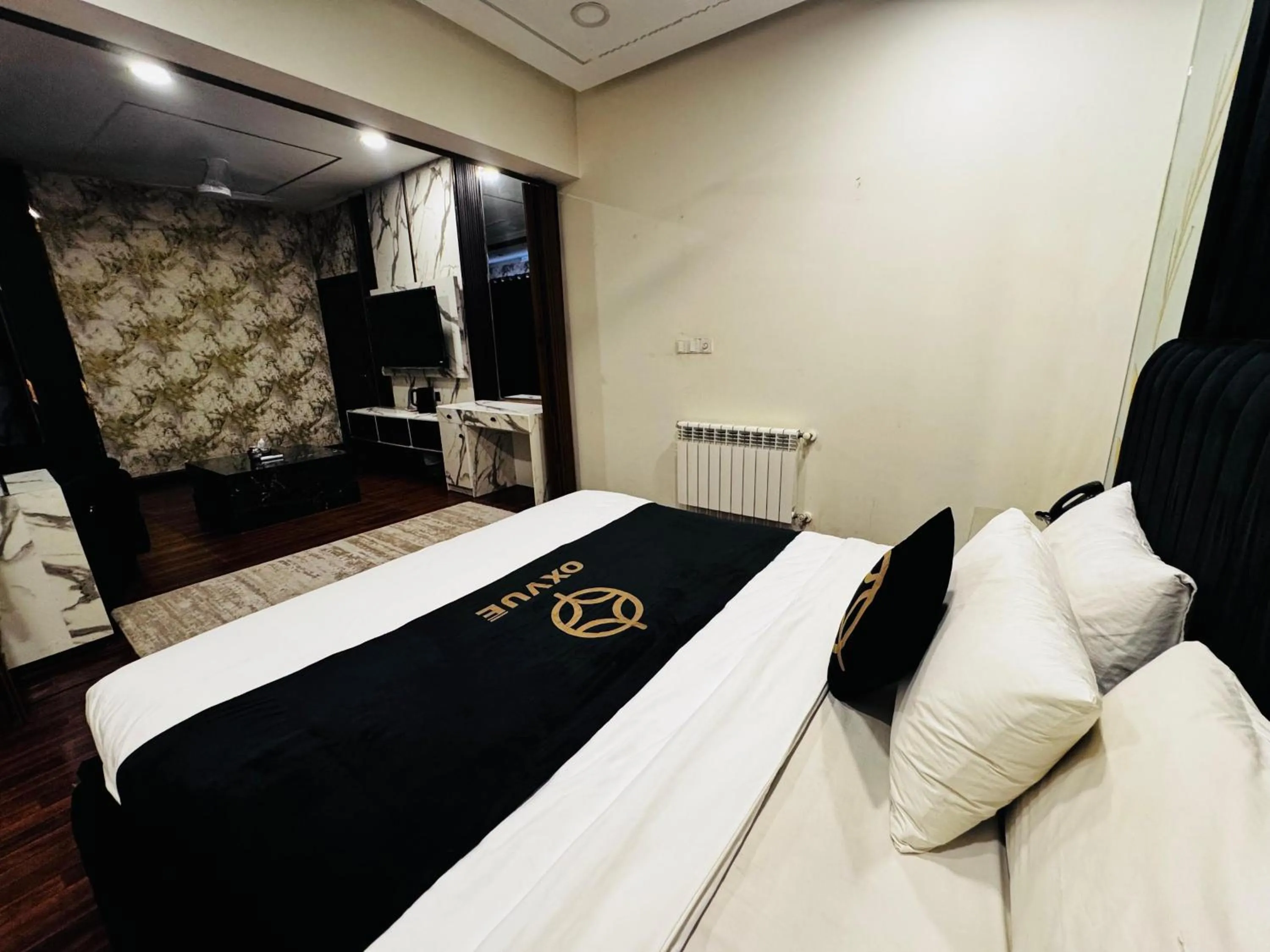 Bed in OXVUE Boutique Hotel