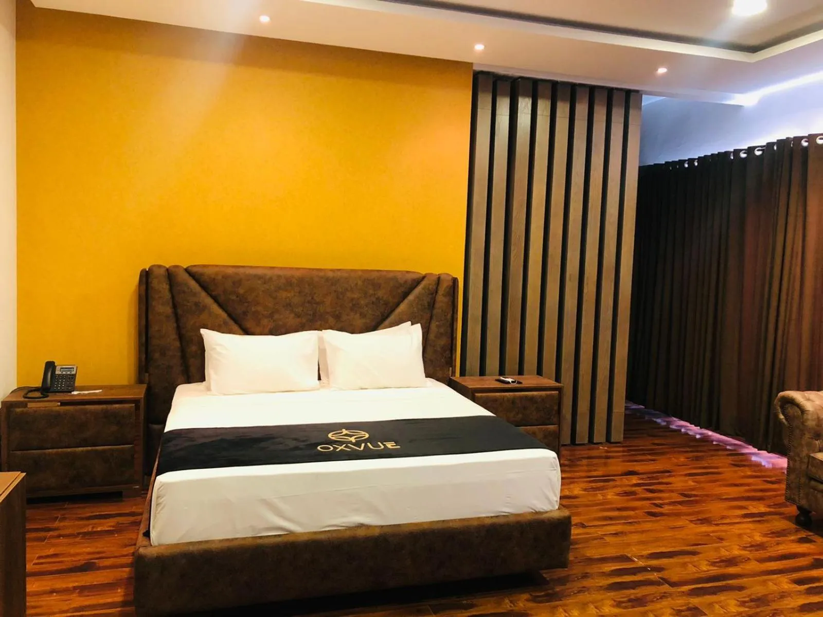 Bed in OXVUE Boutique Hotel