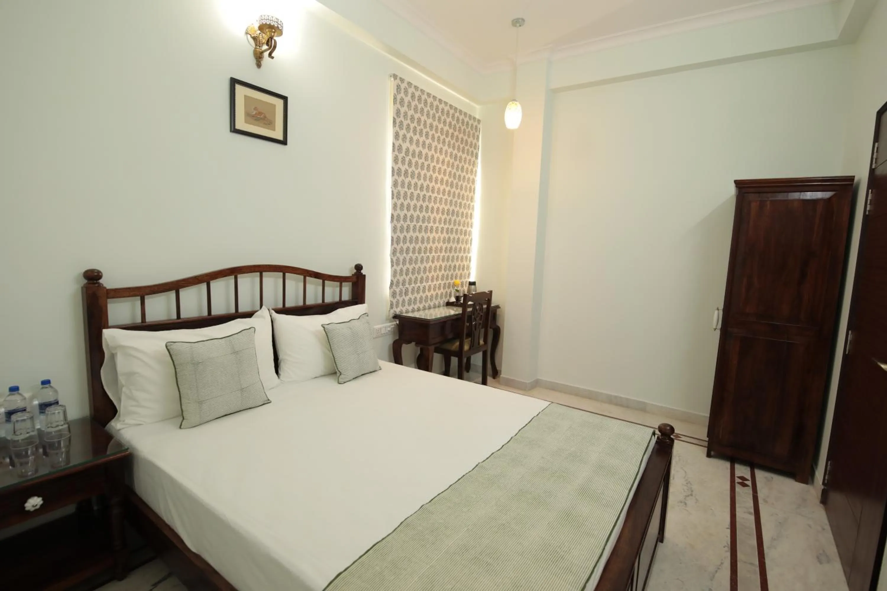 Bed in Jai Villa - A Boutique Hotel