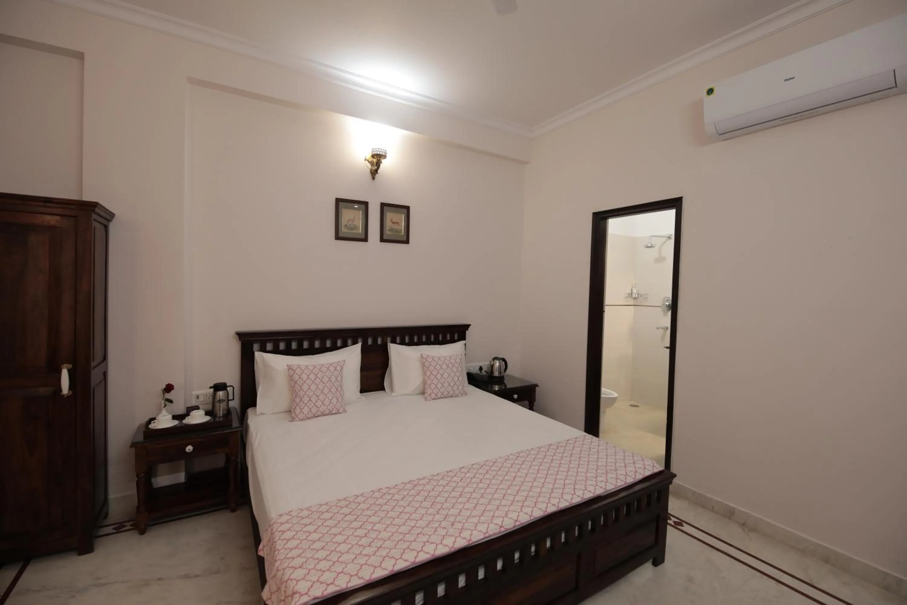 Bed in Jai Villa - A Boutique Hotel