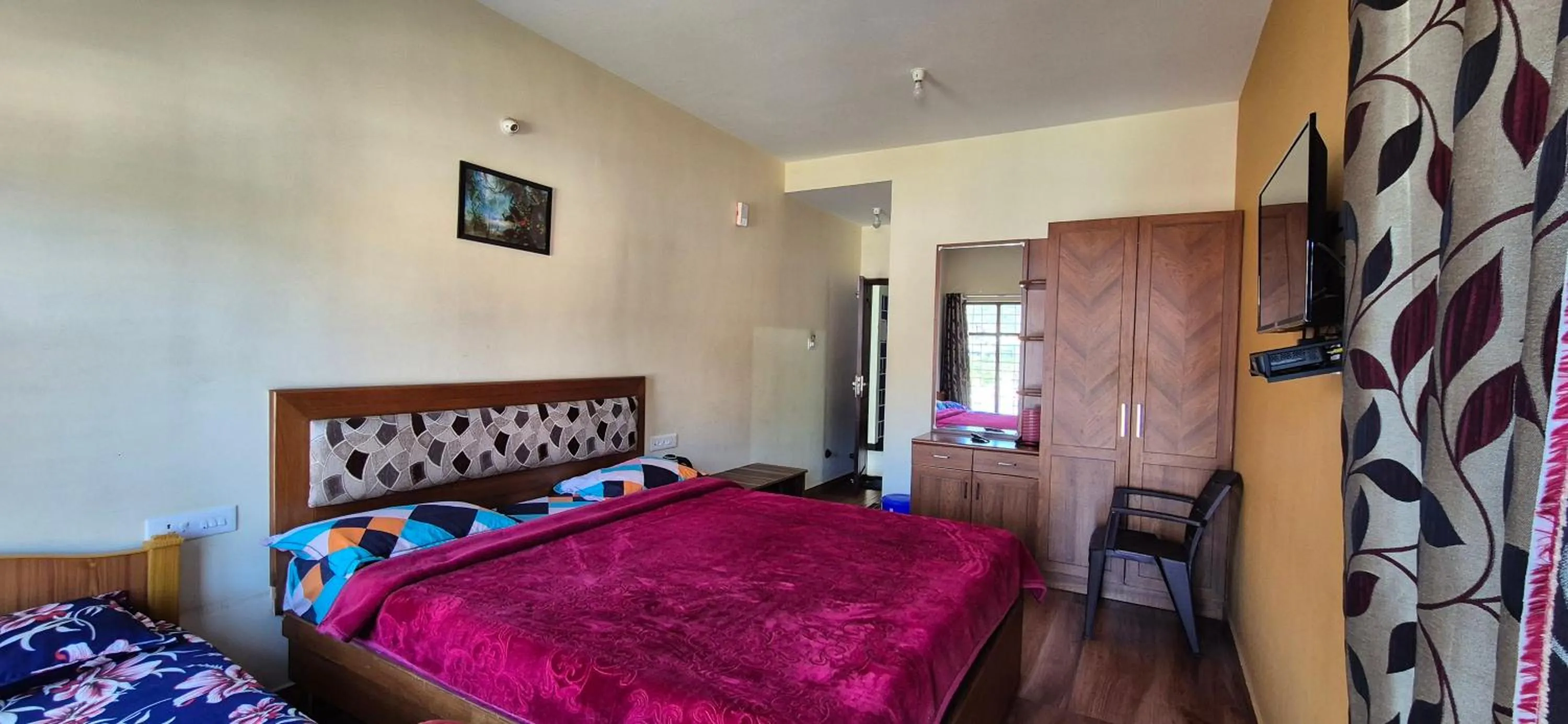 Bedroom, Bed in Karpagam Residency