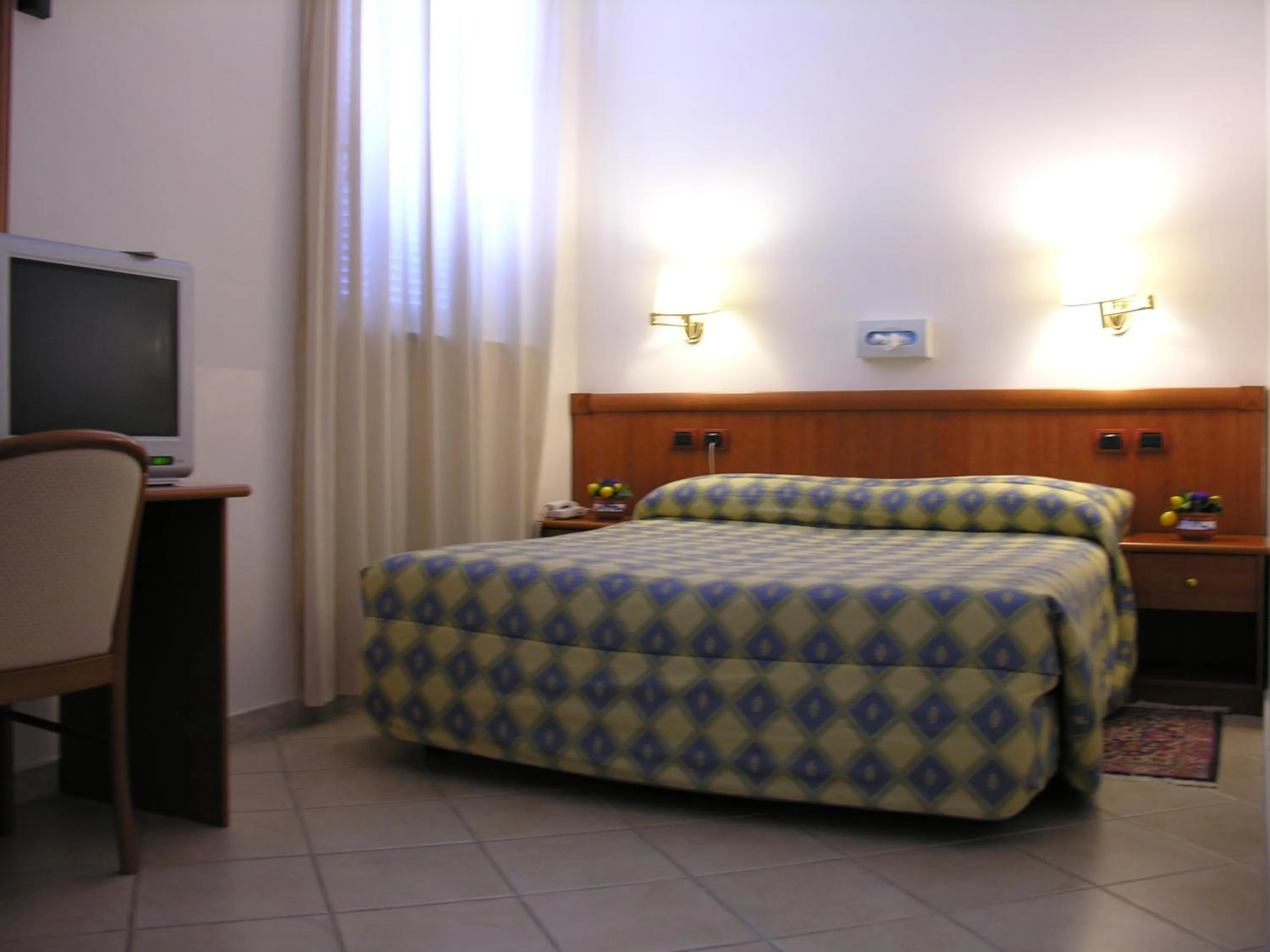 Bed in Hotel San Marco