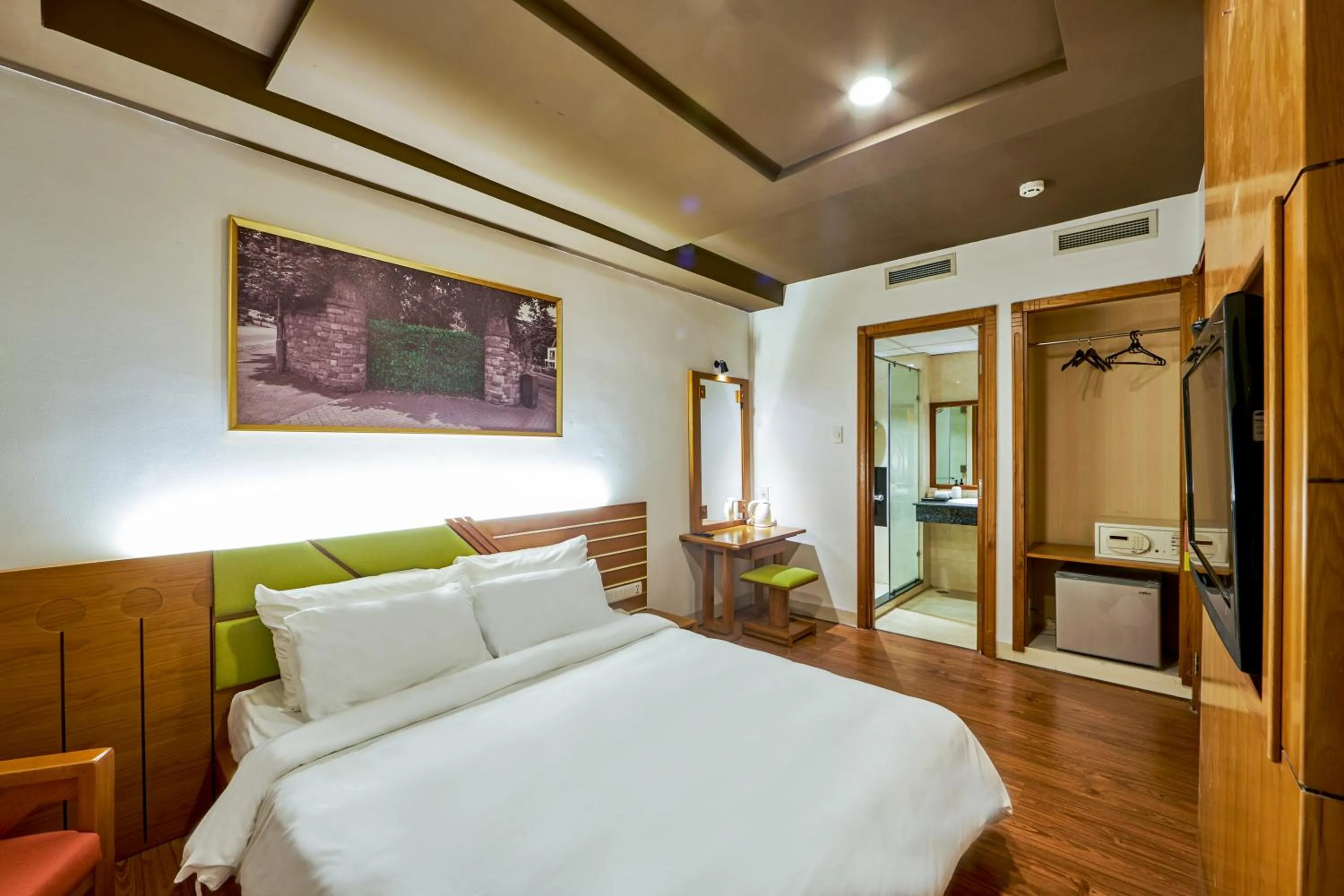 Bedroom in The Noble Swan Hotel Saigon