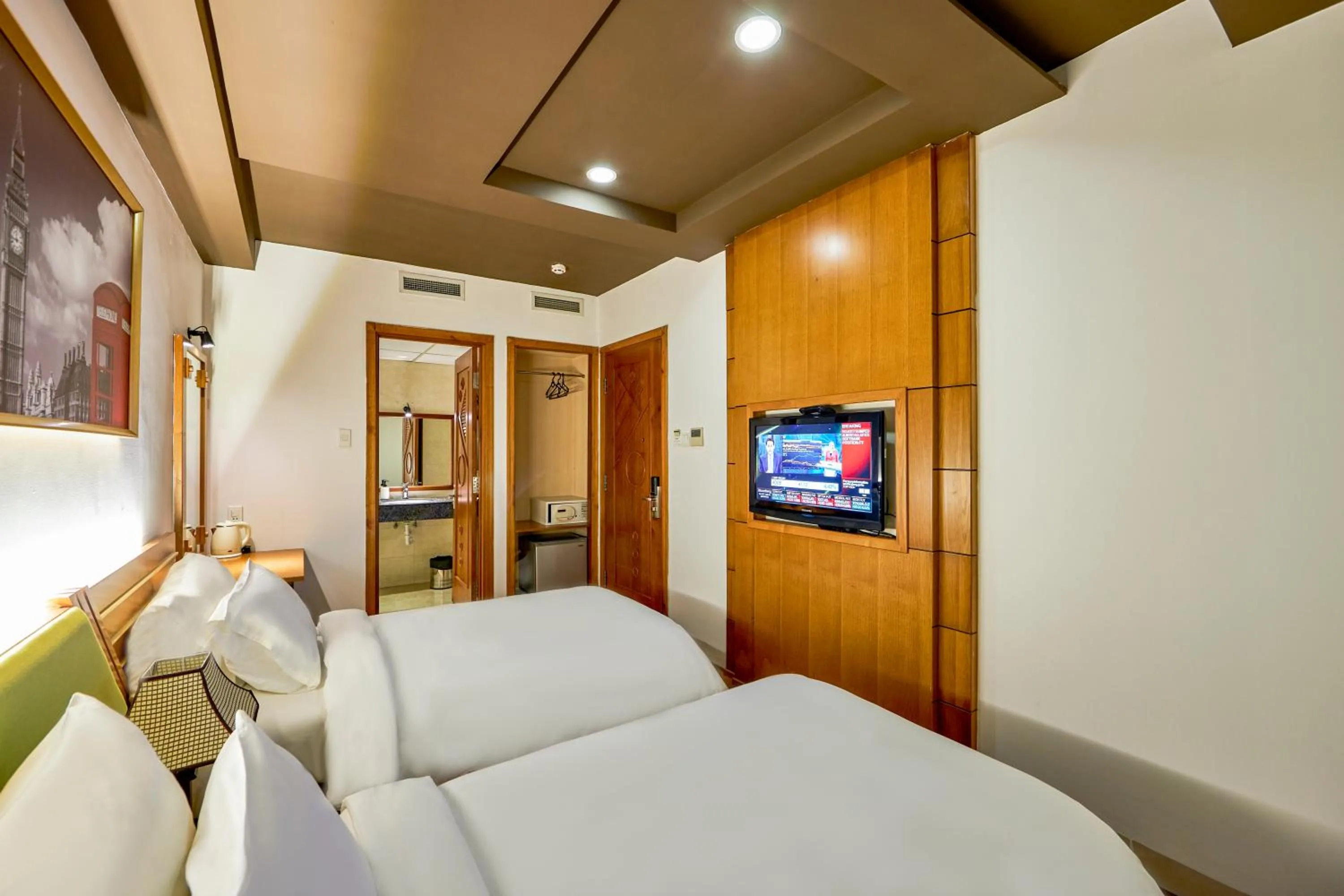 Bedroom in The Noble Swan Hotel Saigon