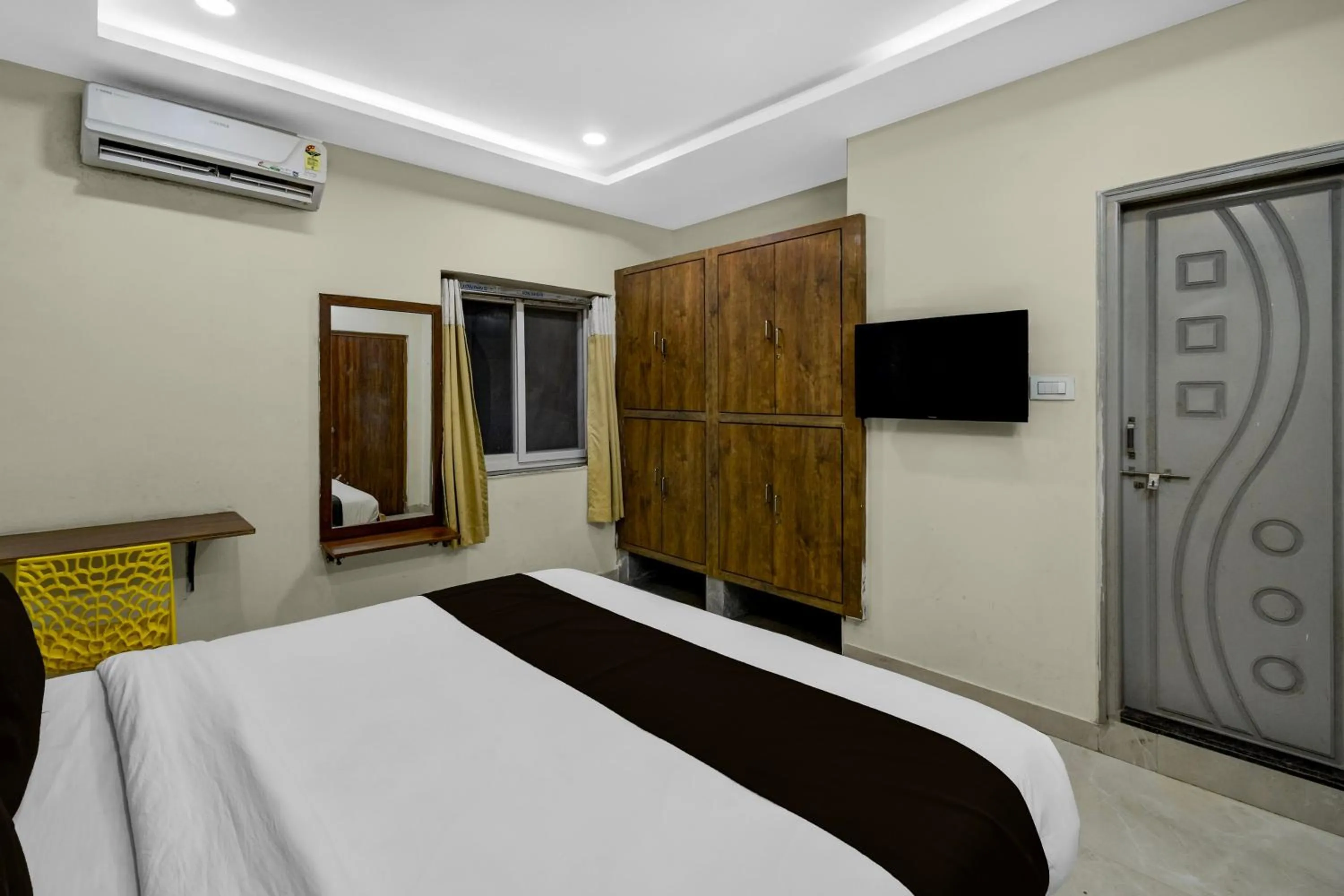 Bedroom, Bed in Townhouse Financial District Gachibowli Formerly Srinika Inn