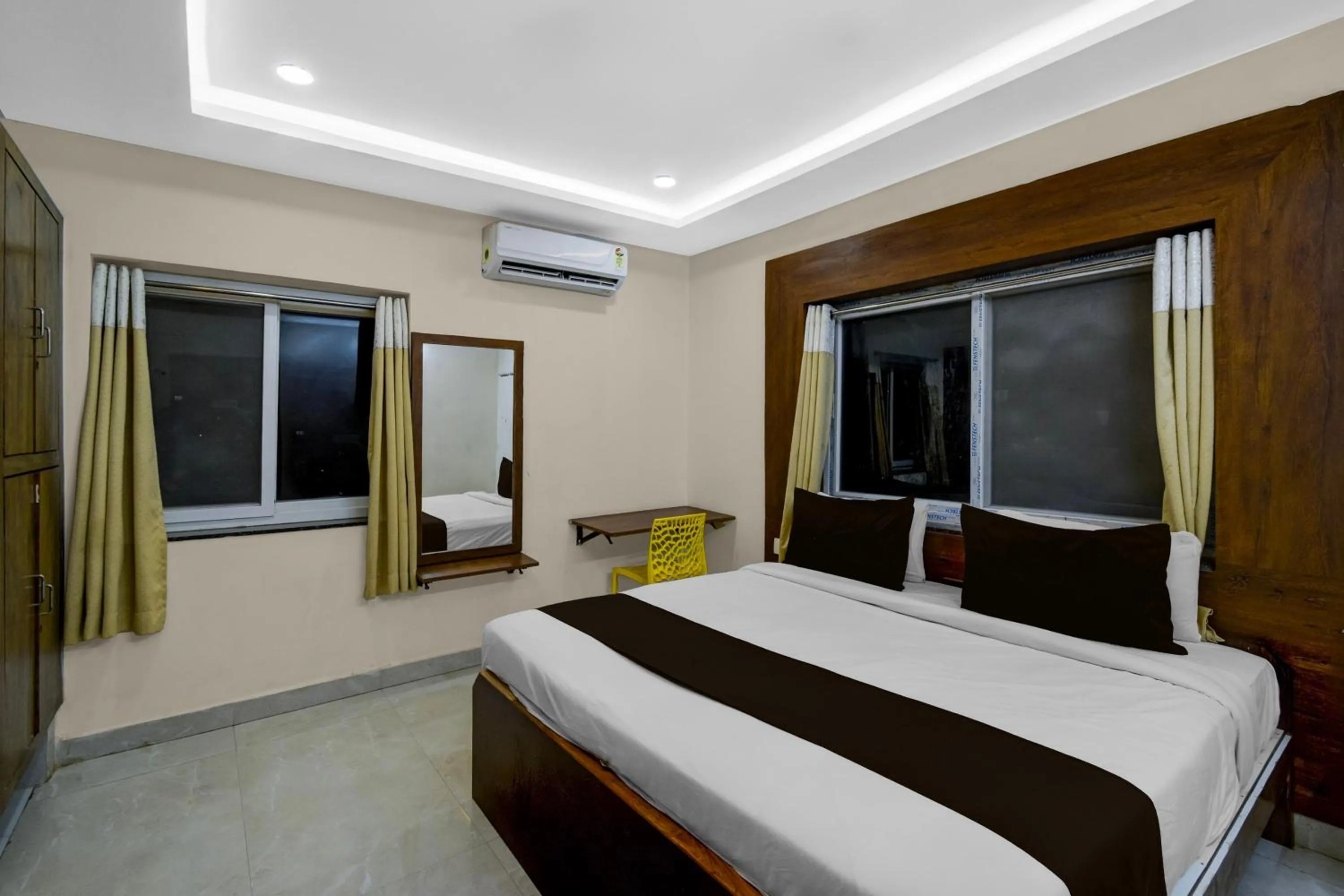 Bedroom, Bed in Townhouse Financial District Gachibowli Formerly Srinika Inn