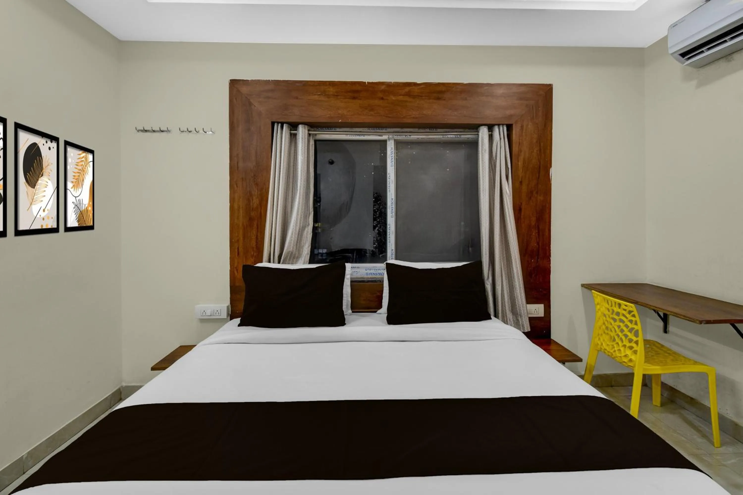 Bedroom, Bed in Townhouse Financial District Gachibowli Formerly Srinika Inn