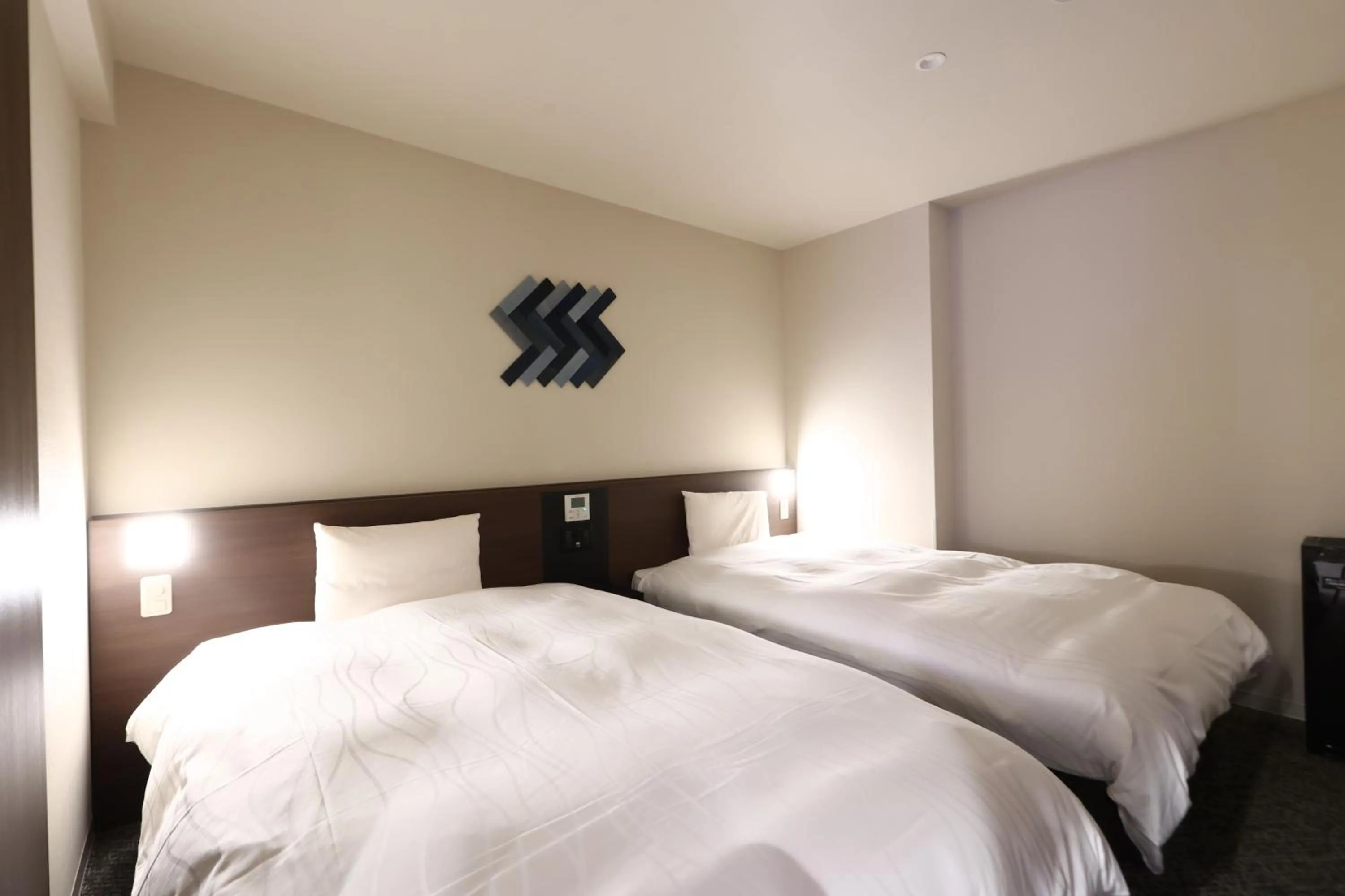 Bed in Dormy Inn Okayama Natural Hot Spring