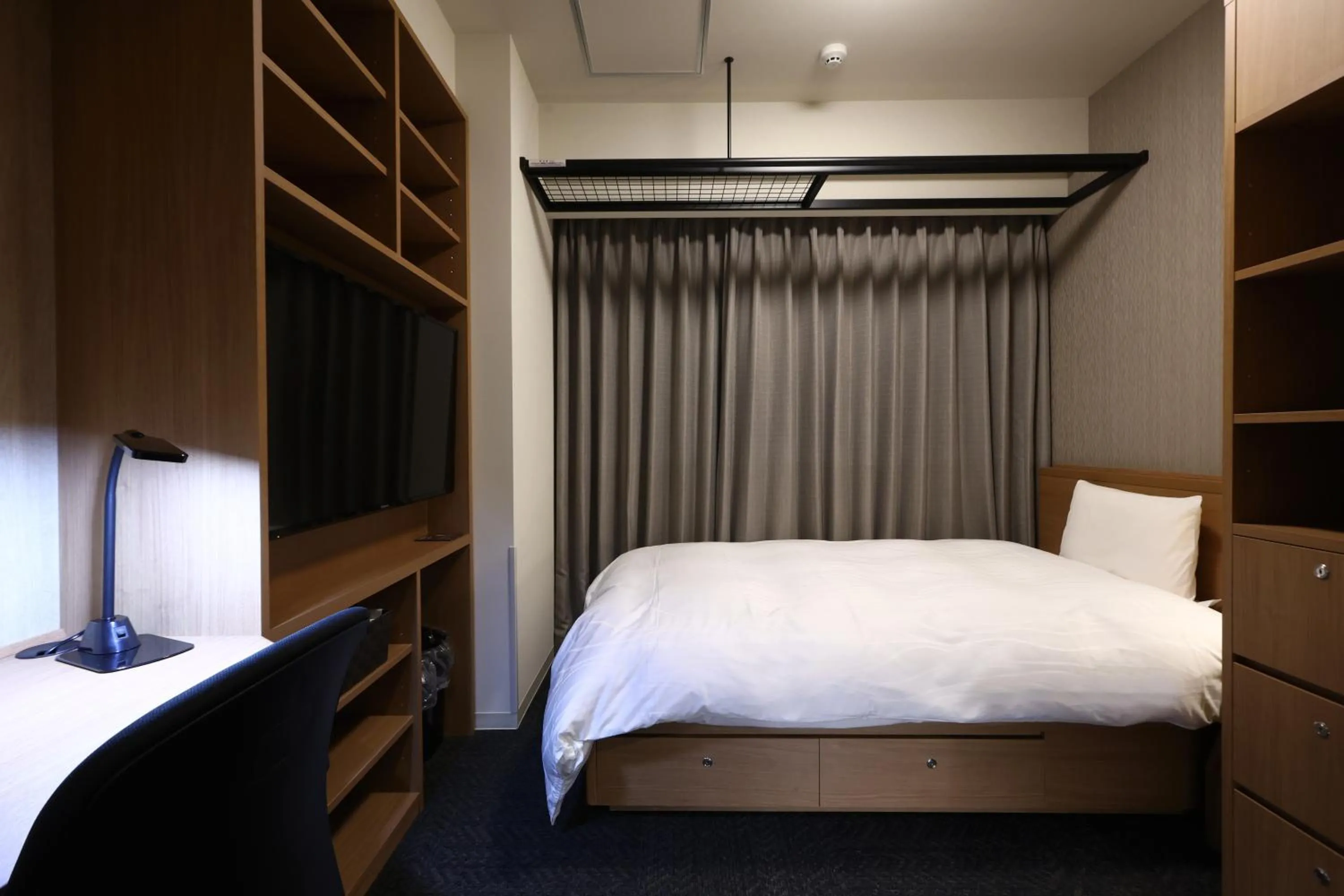 Bed in Dormy Inn Okayama Natural Hot Spring