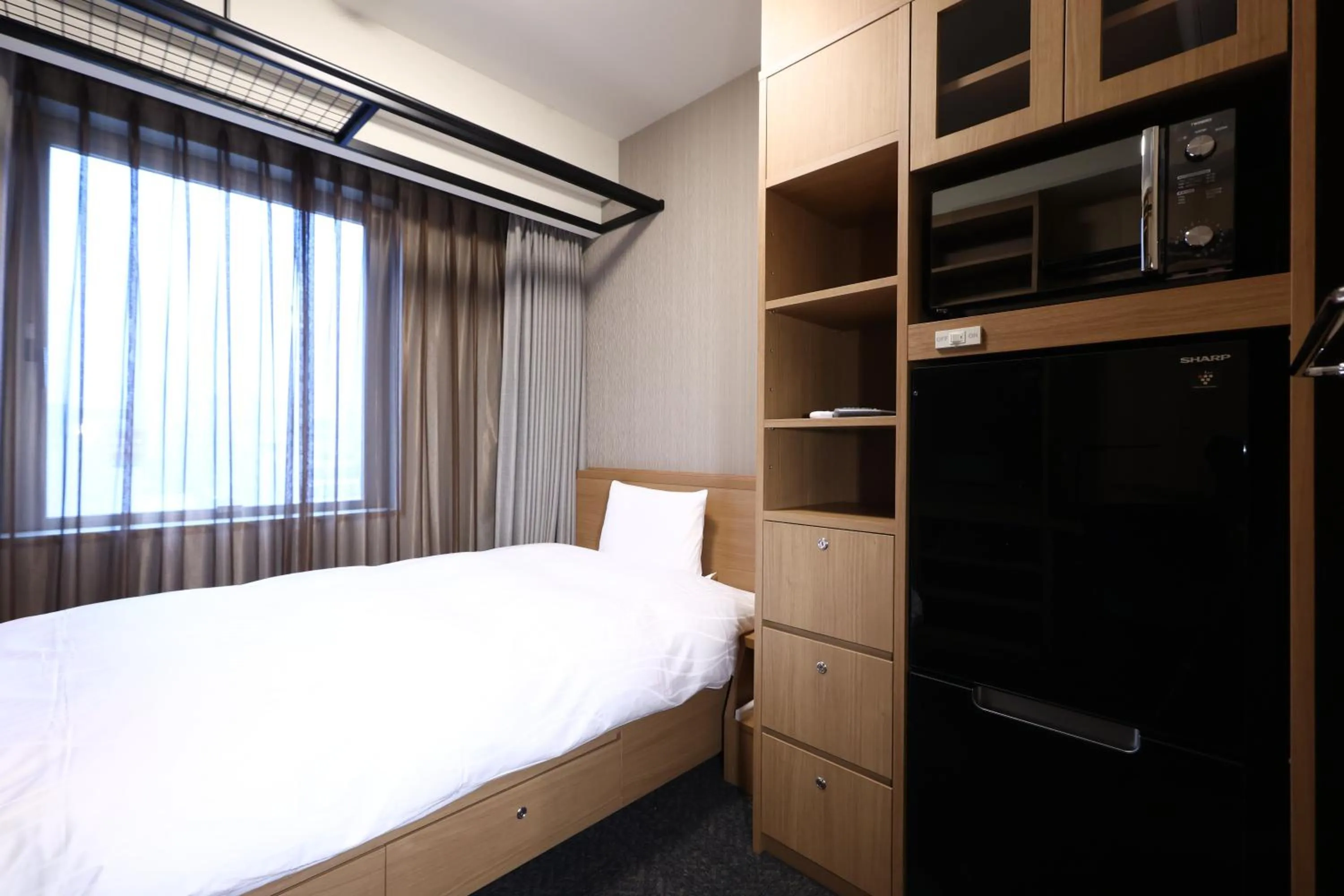 Bed in Dormy Inn Okayama Natural Hot Spring