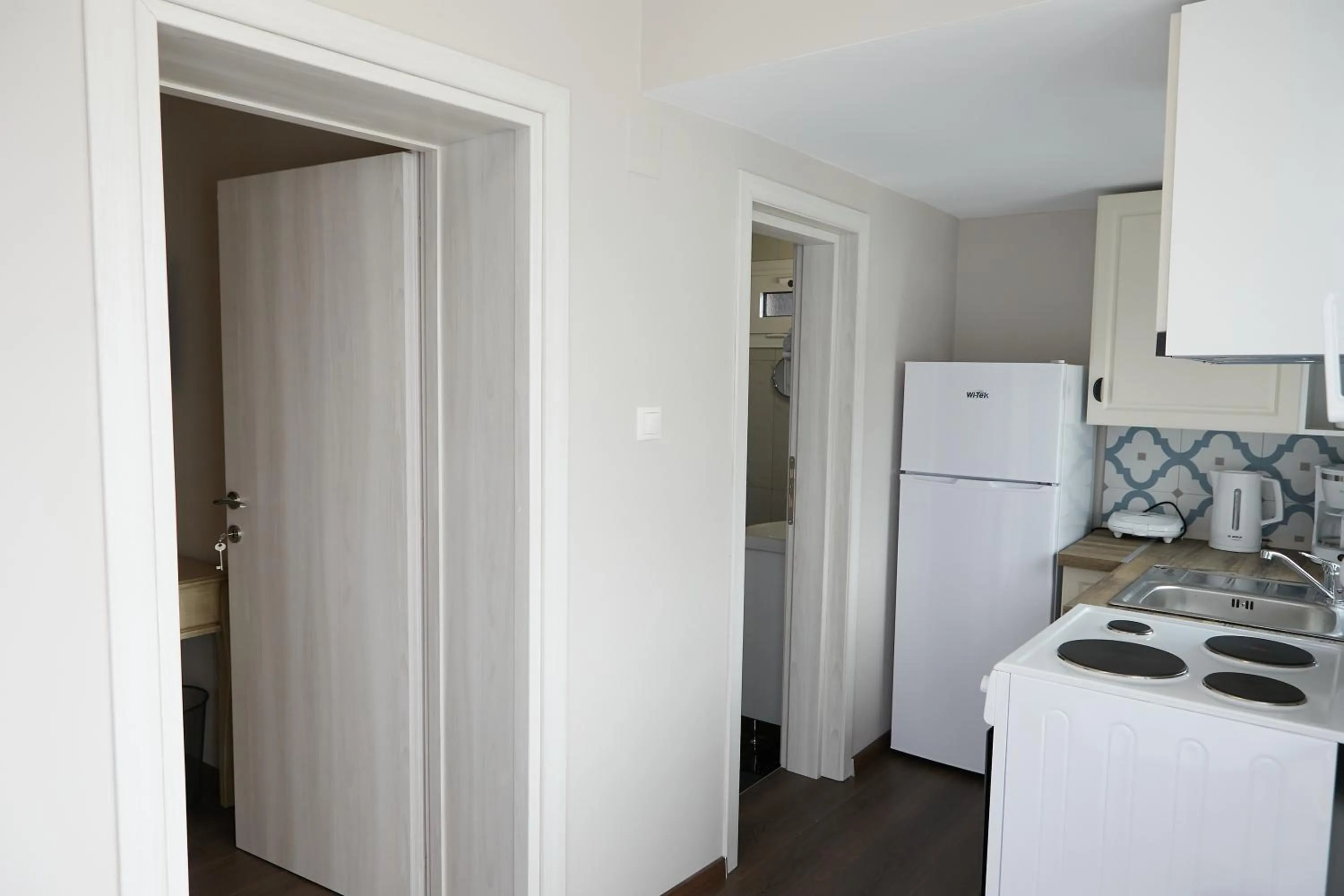 Kitchen or kitchenette in Romilia Guesthouse