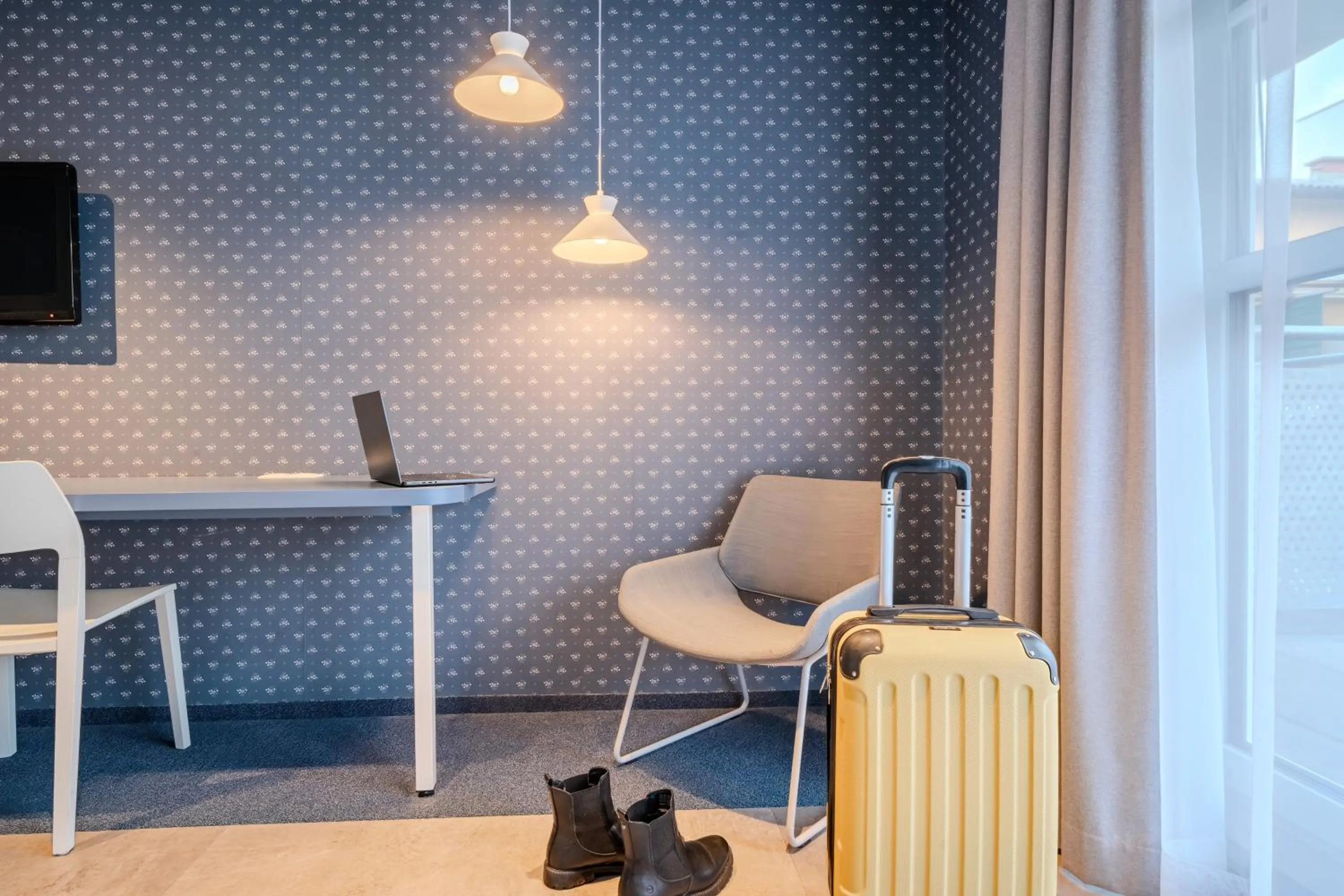 Seating area in ibis Styles Graz Messe