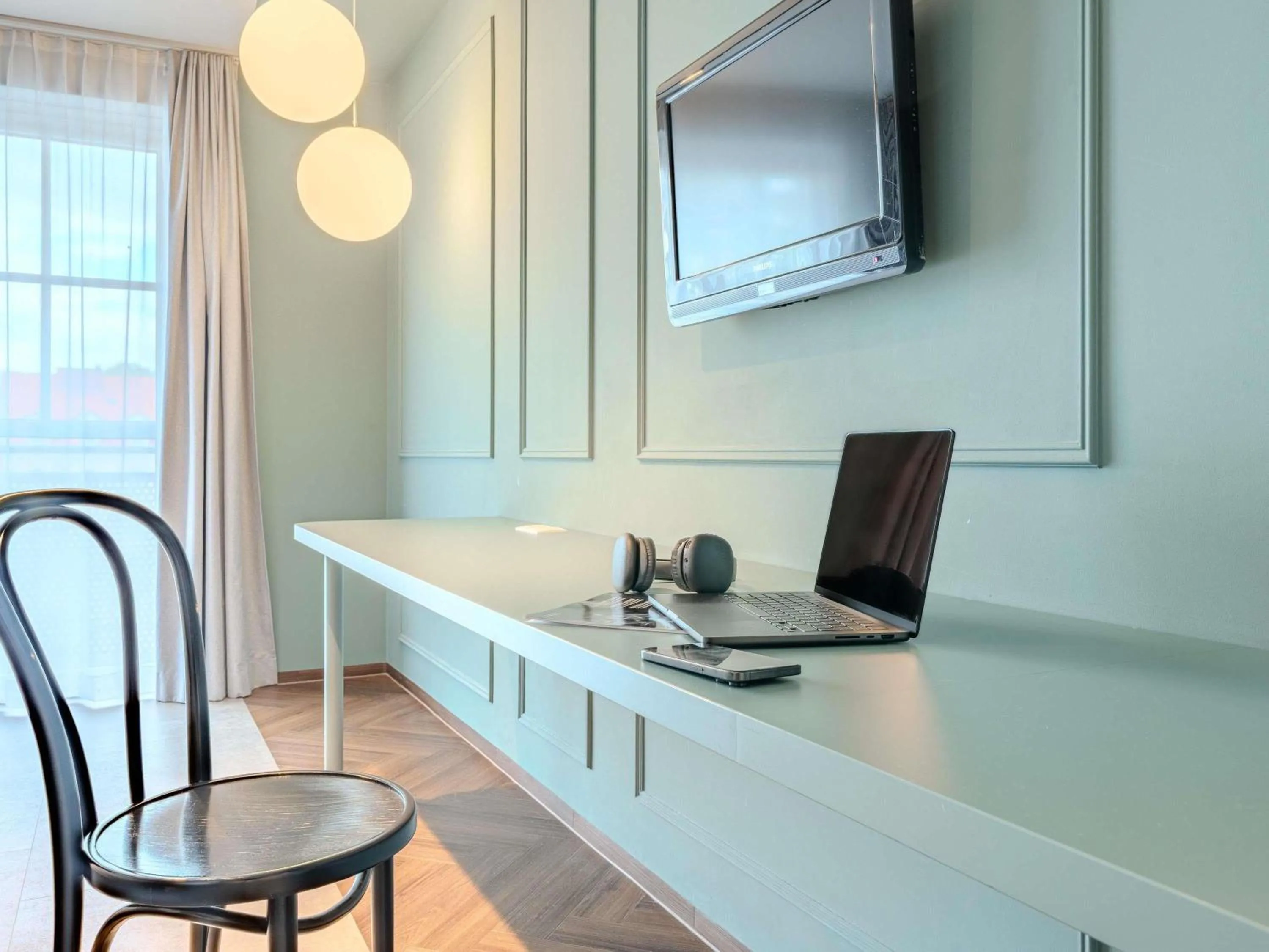 Bedroom in ibis Styles Graz Messe